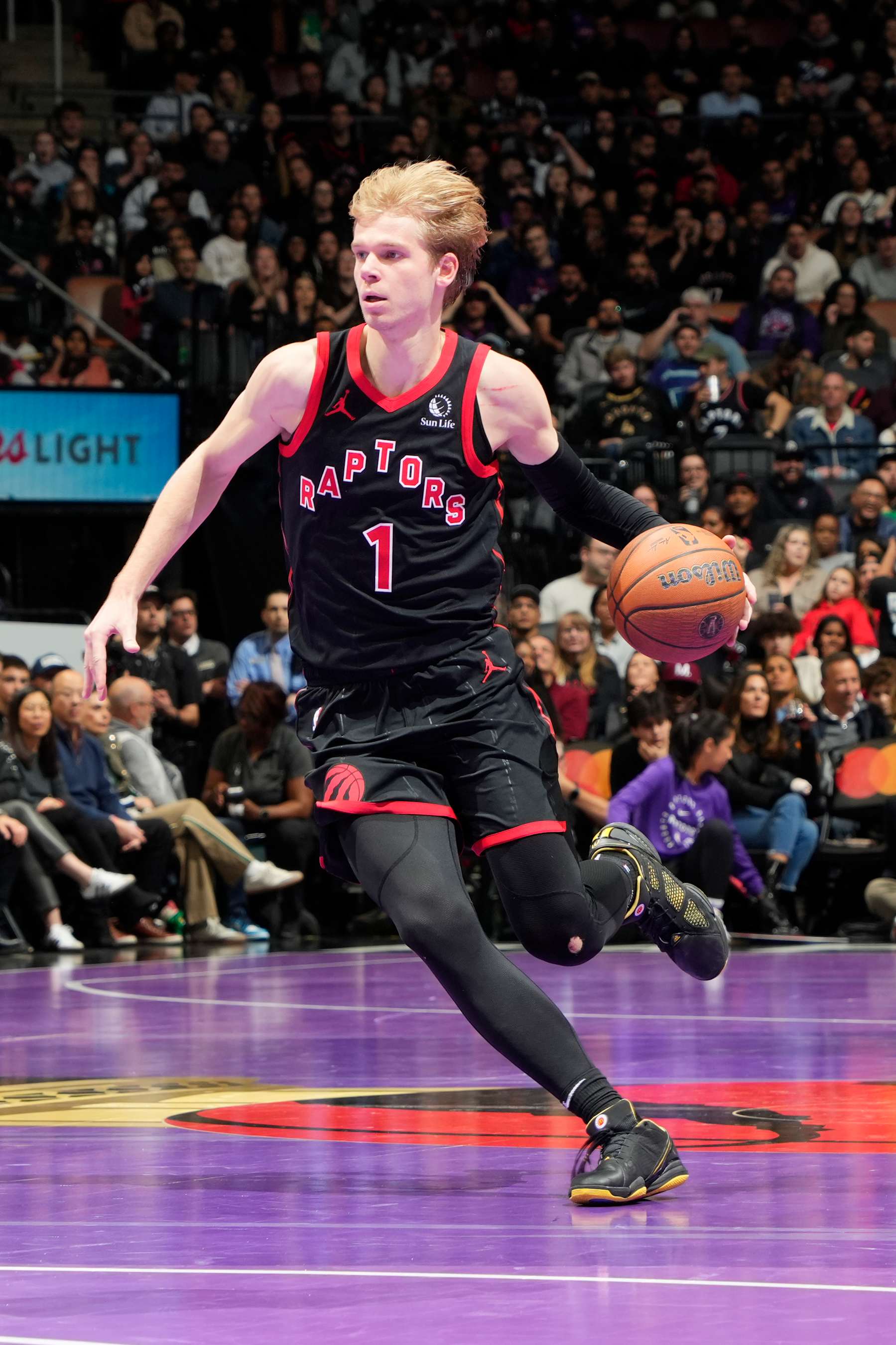 TORONTO, CANADA - NOVEMBER 15:Gradey Dick #1 of the Toronto Raptors dribbles the ball during the game against the Detroit Pistons during the Emirates NBA CUP game  on November 15, 2024 at the Scotiabank Arena in Toronto, Ontario, Canada.  NOTE TO USER: User expressly acknowledges and agrees that, by downloading and or using this Photograph, user is consenting to the terms and conditions of the Getty Images License Agreement.  Mandatory Copyright Notice: Copyright 2024 NBAE (Photo by Mark Blinch/NBAE via Getty Images)