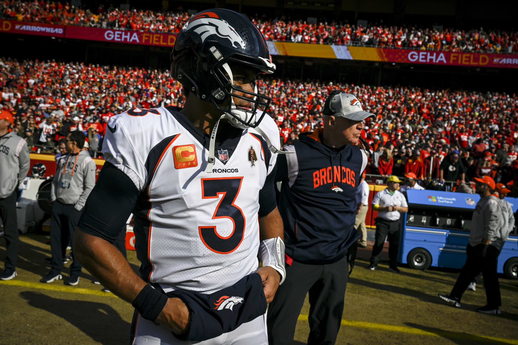 KANSAS CITY, MO - JANUARY 1: Russell Wilson (3) and interim head coach Jerry Rosburg of the Denver Broncos prepare for action before the first quarter against the Kansas City Chiefs at GEHA at Arrowhead Stadium on Sunday, January 1, 2023. (Photo by AAron Ontiveroz/MediaNews Group/The Denver Post via Getty Images)