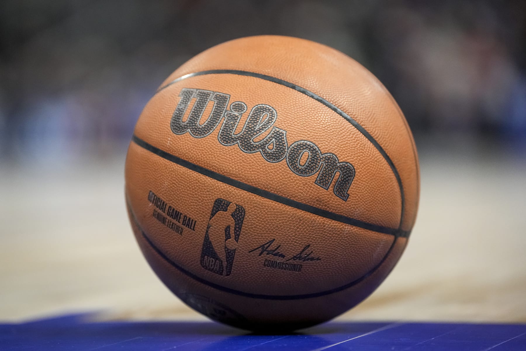 DETROIT, MICHIGAN - MARCH 31: The NBA logo is pictured on a Wilson brand basketball during the game between the Detroit Pistons and Philadelphia 76ers Little Caesars Arena on March 31, 2022 in Detroit, Michigan. NOTE TO USER: User expressly acknowledges and agrees that, by downloading and or using this photograph, User is consenting to the terms and conditions of the Getty Images License Agreement. (Photo by Nic Antaya/Getty Images)
