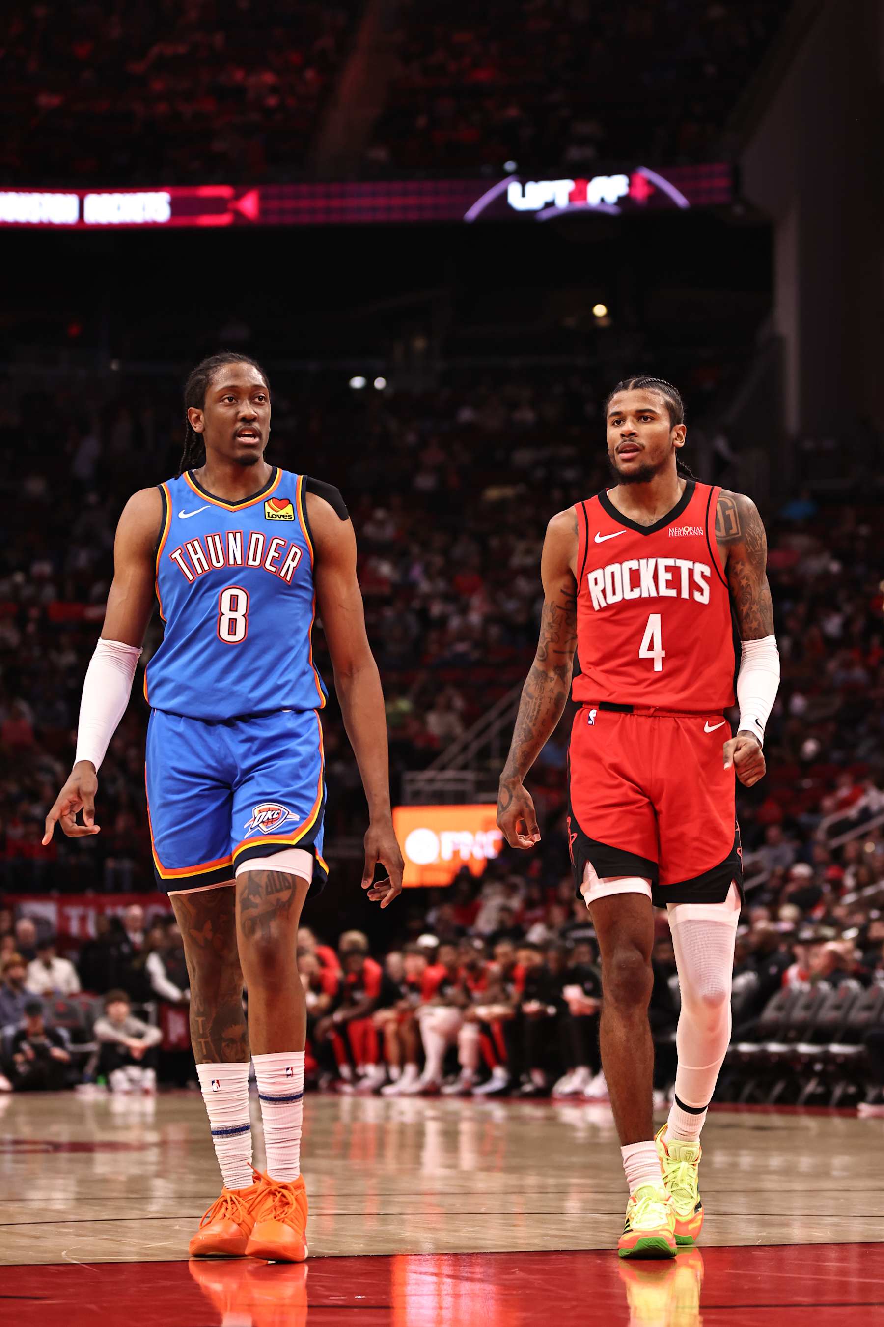 HOUSTON, TX - DECEMBER 1:  Jalen Williams #8 of the Oklahoma City Thunder and Jalen Green #4 of the Houston Rockets looks on during the game on December 1, 2024 at the Toyota Center in Houston, Texas. NOTE TO USER: User expressly acknowledges and agrees that, by downloading and or using this photograph, User is consenting to the terms and conditions of the Getty Images License Agreement. Mandatory Copyright Notice: Copyright 2024 NBAE (Photo by Lottie Spears/NBAE via Getty Images)