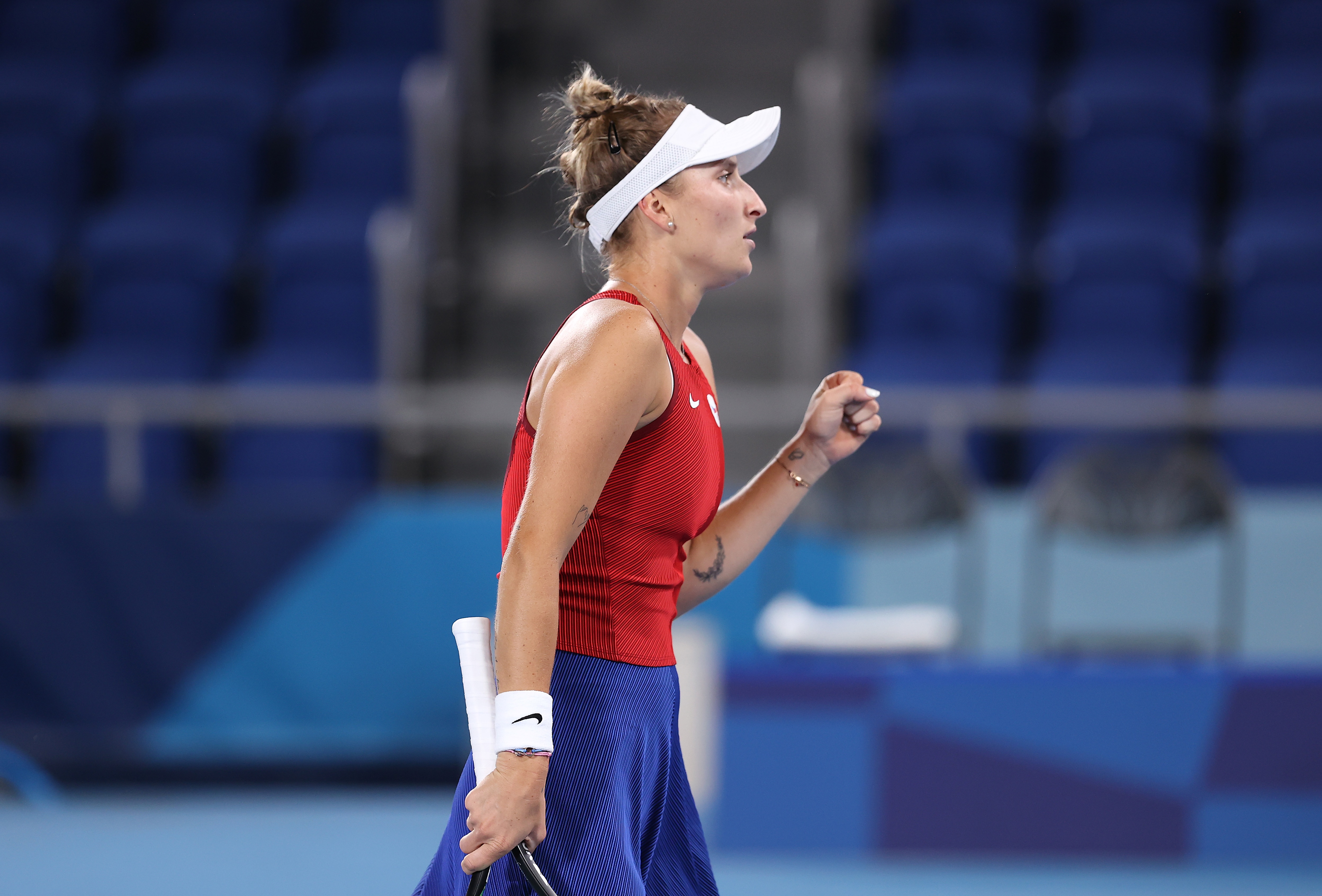 TOKYO, JAPAN - JULY 27: Marketa Vondrousova of Team Czech Republic celebrates after a point during her Women's Singles Third Round match against Naomi Osaka of Team Japan on day four of the Tokyo 2020 Olympic Games at Ariake Tennis Park on July 27, 2021 in Tokyo, Japan. (Photo by David Ramos/Getty Images)