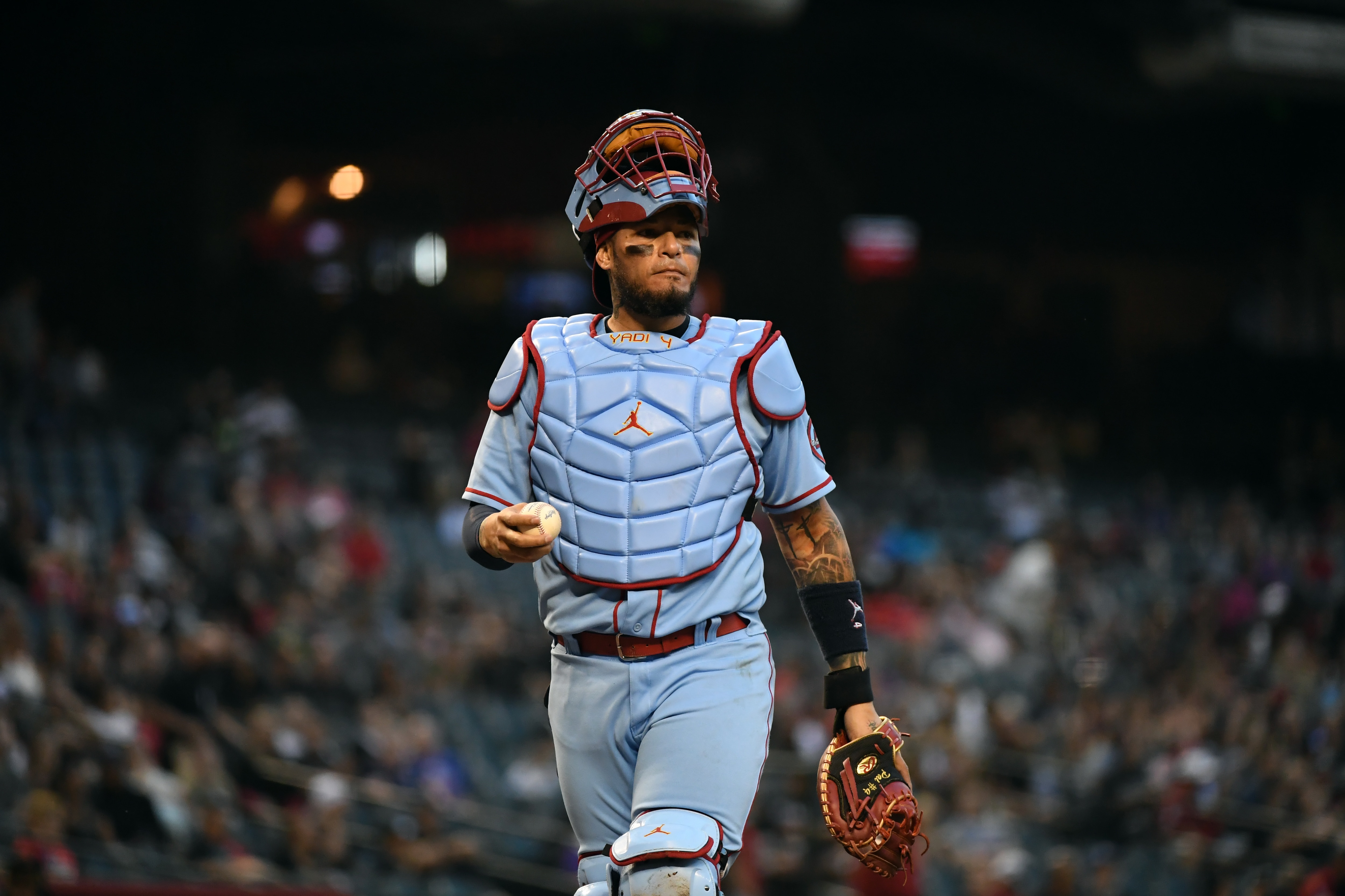 PHOENIX, ARIZONA - MAY 29: Yadier Molina #4 of the St Louis Cardinals looks to the dugout while standing behind home plate against the Arizona Diamondbacks at Chase Field on May 29, 2021 in Phoenix, Arizona. (Photo by Norm Hall/Getty Images)
