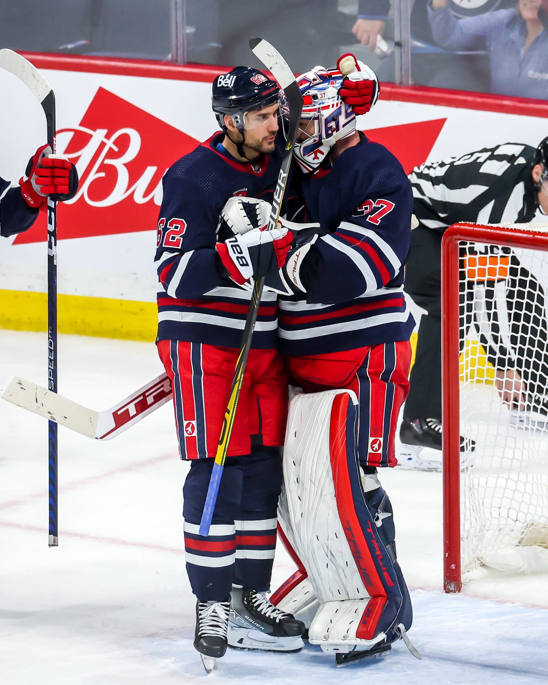 Nino Niederreiter and Connor Hellebuyck will be in Winnipeg for the foreseeable future.