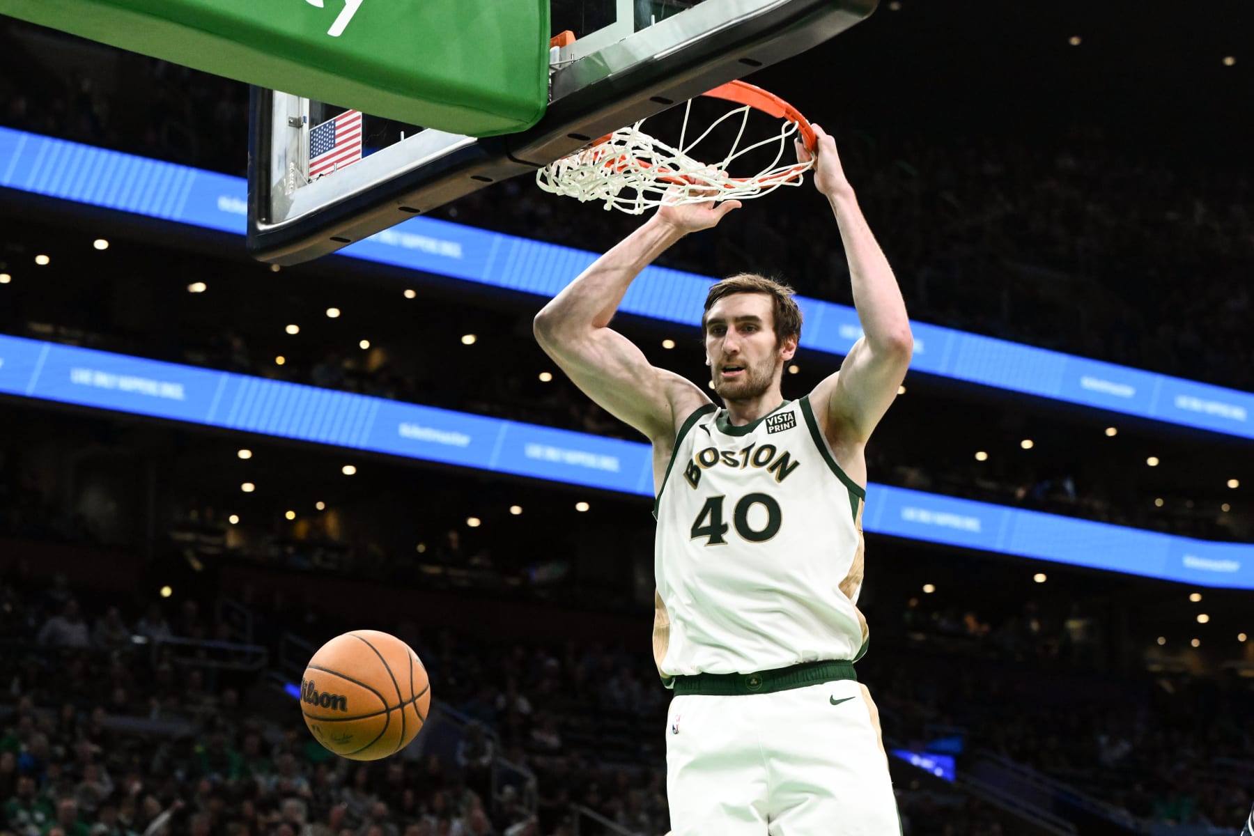 BOSTON, MASSACHUSETTS - APRIL 14: Luke Kornet #40 of the Boston Celtics dunks and scores against the Washington Wizards during the fourth quarter at the TD Garden on April 14, 2024 in Boston, Massachusetts. NOTE TO USER: User expressly acknowledges and agrees that, by downloading and or using this photograph, User is consenting to the terms and conditions of the Getty Images License Agreement. (Photo by Brian Fluharty/Getty Images)