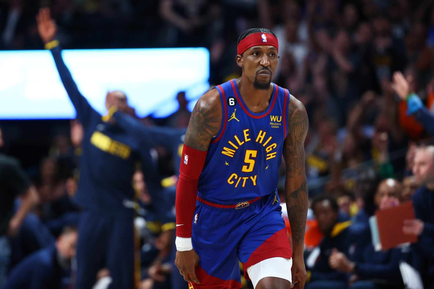 DENVER, CO - OCTOBER 22: Kentavious Caldwell-Pope #5 of the Denver Nuggets reacts in the first quarter of the game against the Oklahoma City Thunder at Ball Arena on October 22, 2022 in Denver, Colorado. NOTE TO USER: User expressly acknowledges and agrees that, by downloading and or using this Photograph, User is consenting to the terms and conditions of the Getty Images License Agreement. Mandatory Copyright Notice: Copyright 2022 NBAE (Photo by Justin Tafoya/Getty Images)