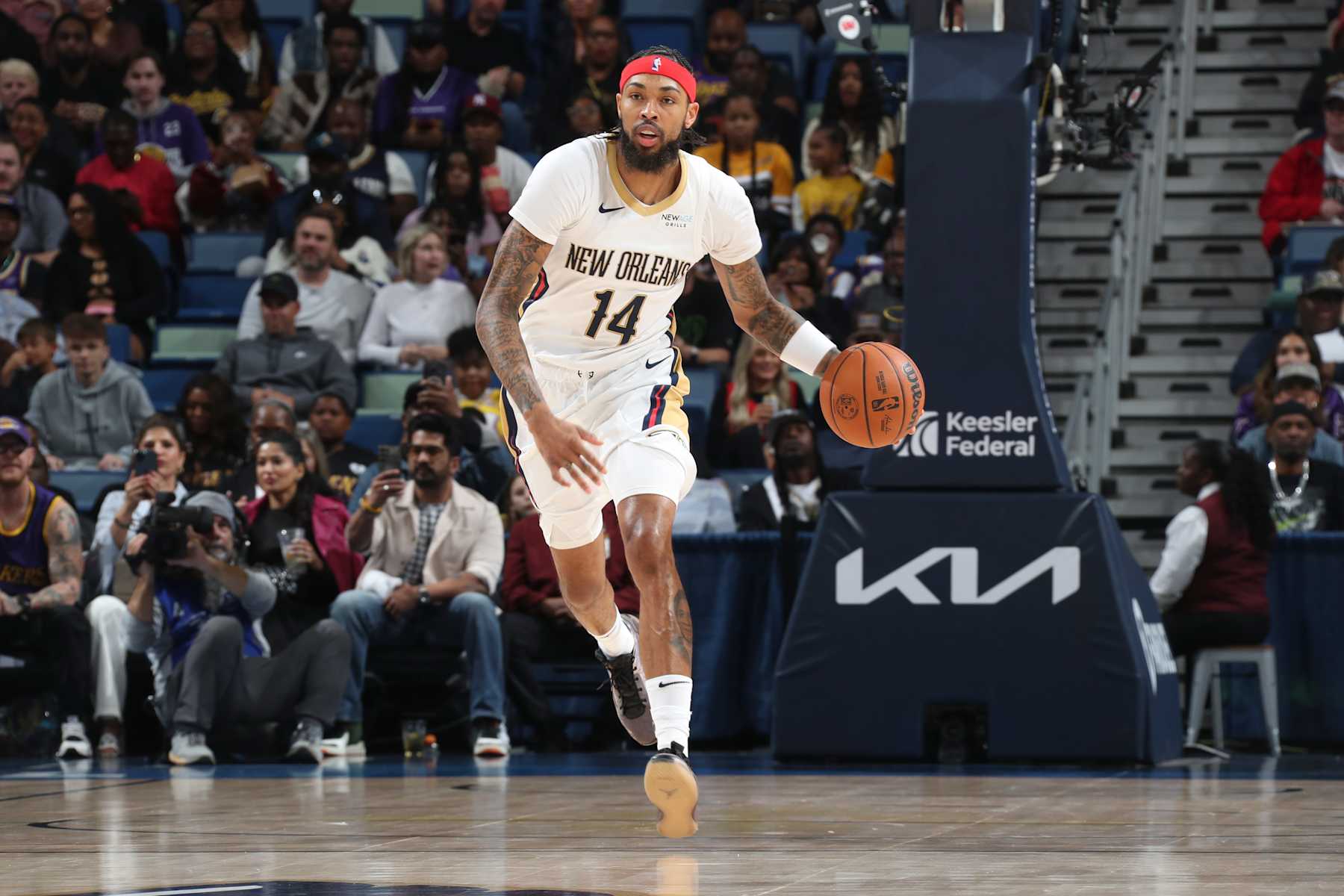 NEW ORLEANS, LA - NOVEMBER 16:  Brandon Ingram #14 of the New Orleans Pelicans dribbles the ball during the game against the Los Angeles Lakers on November 16, 2024 at the Smoothie King Center in New Orleans, Louisiana. NOTE TO USER: User expressly acknowledges and agrees that, by downloading and or using this Photograph, user is consenting to the terms and conditions of the Getty Images License Agreement. Mandatory Copyright Notice: Copyright 2024 NBAE (Photo by Layne Murdoch Jr./NBAE via Getty Images)