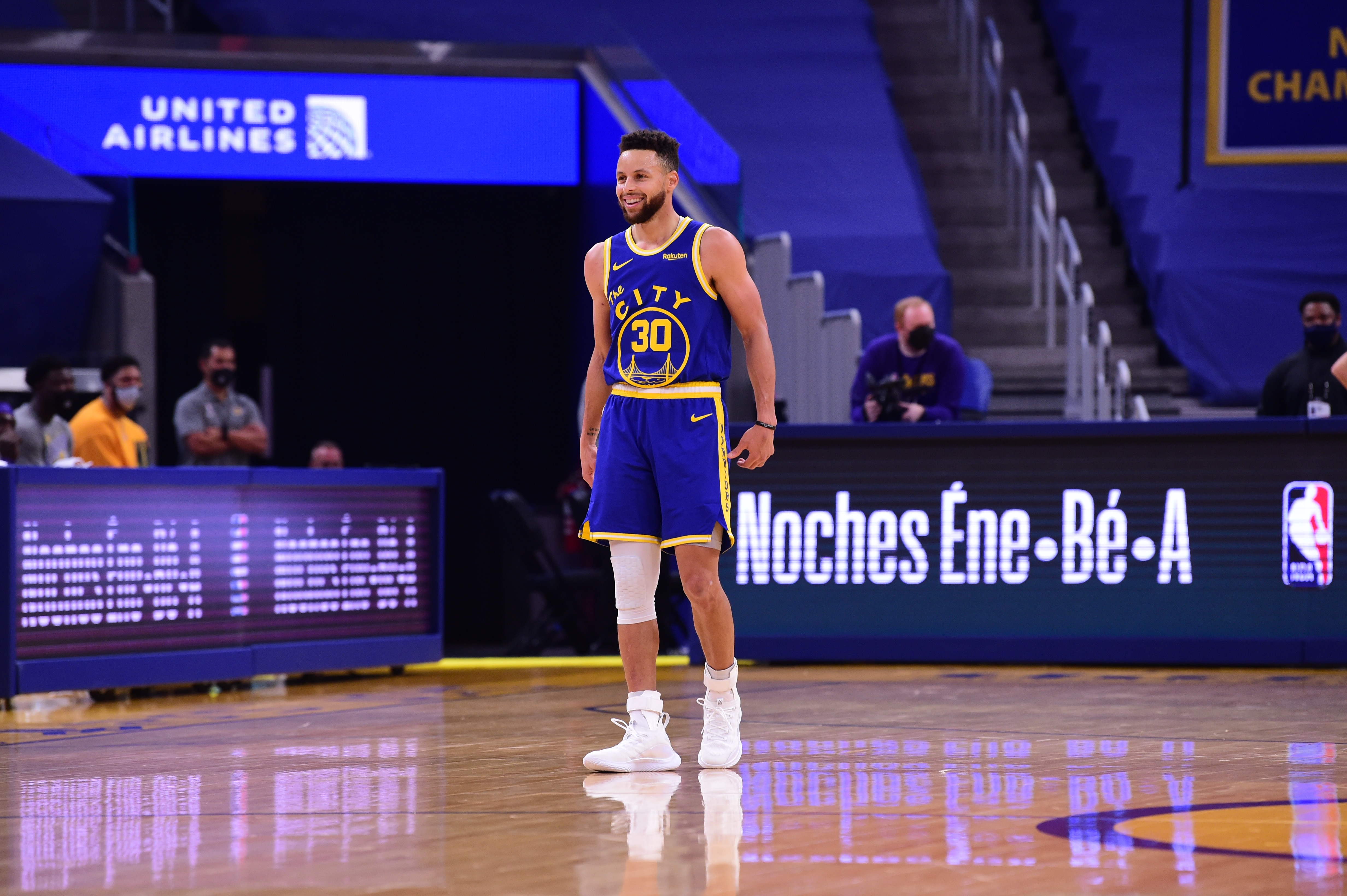 SAN FRANCISCO, CA - MARCH 15: Stephen Curry #30 of the Golden State Warriors smiles during the game against the Los Angeles Lakers on March 15, 2021 at Chase Center in San Francisco, California. NOTE TO USER: User expressly acknowledges and agrees that, by downloading and or using this photograph, user is consenting to the terms and conditions of Getty Images License Agreement. Mandatory Copyright Notice: Copyright 2021 NBAE (Photo by Noah Graham/NBAE via Getty Images)