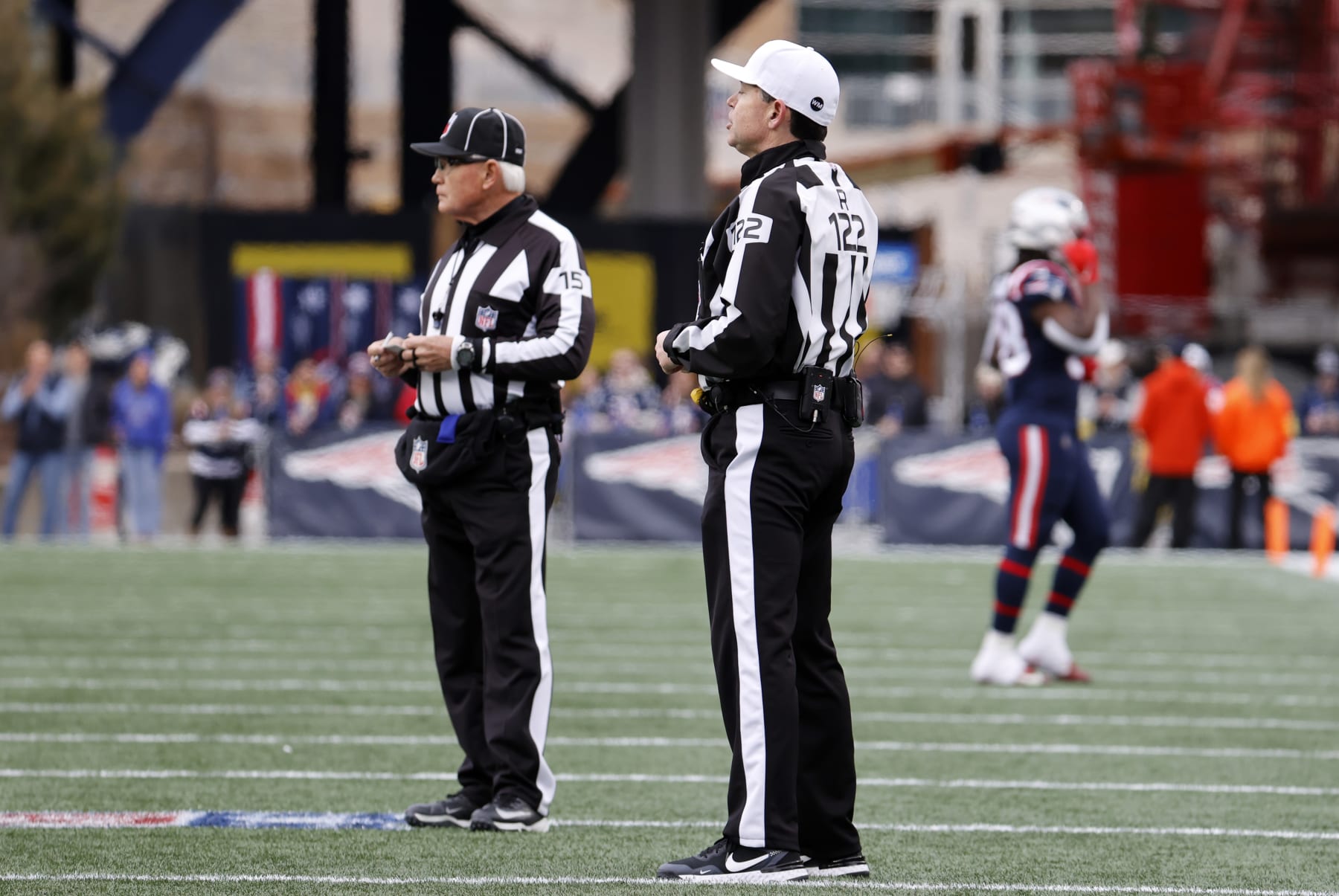 FOXBOROUGH, MA - JANUARY 01: Referee Brad Allen (122) makes a call during a game between the New England Patriots and the Miami Dolphins on January 1, 2023, at Gillette Stadium in Foxboro, Massachusetts. (Photo by Fred Kfoury III/Icon Sportswire via Getty Images)