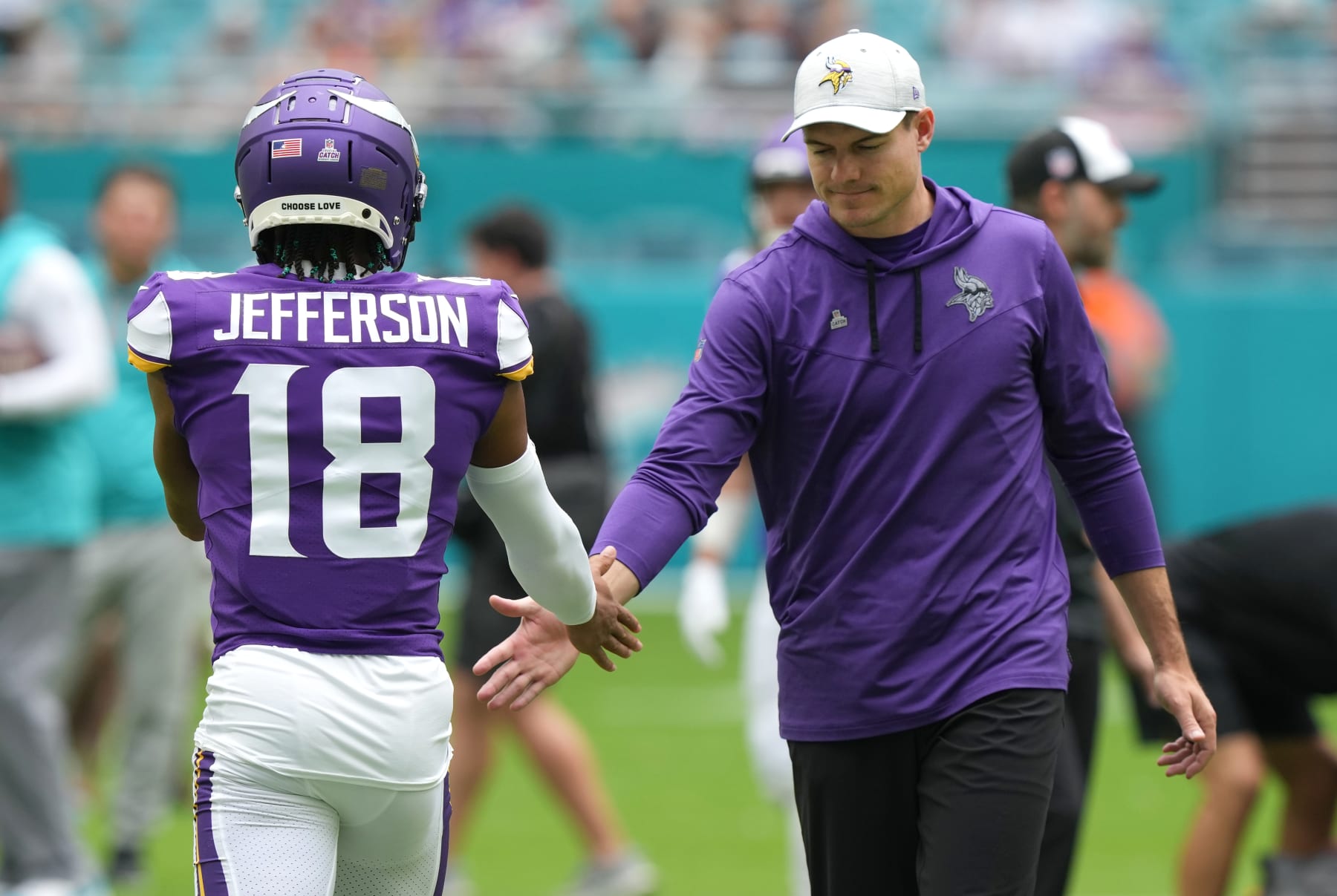 MIAMI GARDENS, FLORIDA - OCTOBER 16: Head coach Kevin O'Connell of the Minnesota Vikings slaps hands with Justin Jefferson #18 before the start of a game against the Miami Dolphins at Hard Rock Stadium on October 16, 2022 in Miami Gardens, Florida. (Photo by Eric Espada/Getty Images)