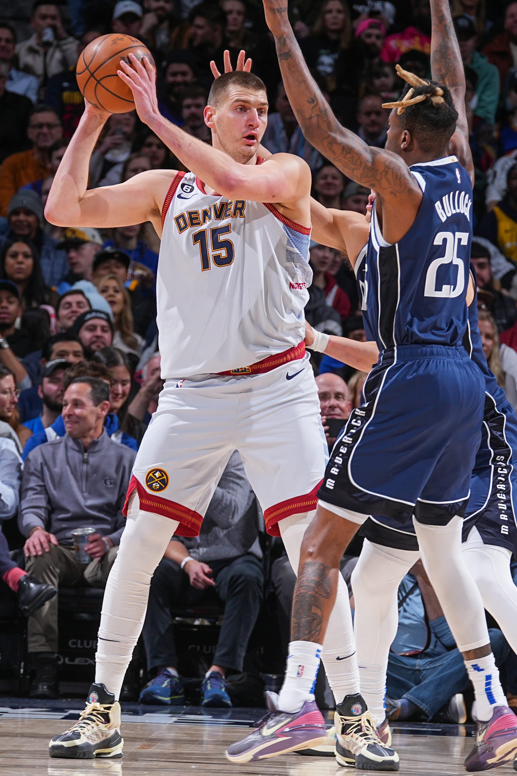 DENVER, CO - FEBUARY 15:  Nikola Jokic #15 of the Denver Nuggets handles the ball during the game  on Febuary 15, 2023 at the Ball Arena in Denver, Colorado. NOTE TO USER: User expressly acknowledges and agrees that, by downloading and/or using this Photograph, user is consenting to the terms and conditions of the Getty Images License Agreement. Mandatory Copyright Notice: Copyright 2023 NBAE (Photo by Bart Young/NBAE via Getty Images)