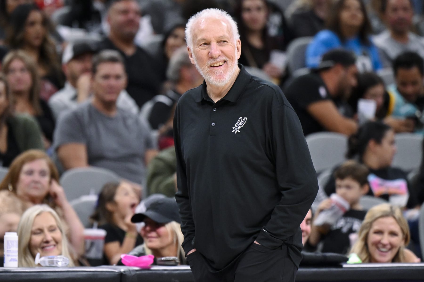 San Antonio Spurs head coach Gregg Popovich watches play during the second half of a preseason NBA basketball game against the Houston Rockets, Wednesday, Oct. 18, 2023, in San Antonio. San Antonio won 117-103. (AP Photo/Darren Abate)