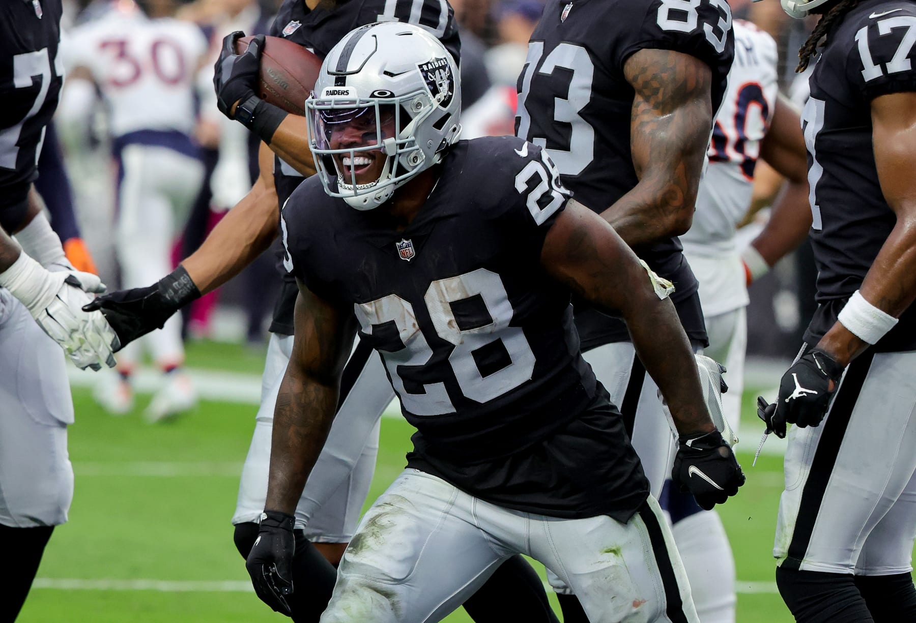 LAS VEGAS, NEVADA - OCTOBER 02: Josh Jacobs #28 of the Las Vegas Raiders celebrates after scoring a touchdown in the second quarter against the Denver Broncos at Allegiant Stadium on October 02, 2022 in Las Vegas, Nevada. (Photo by Ethan Miller/Getty Images)