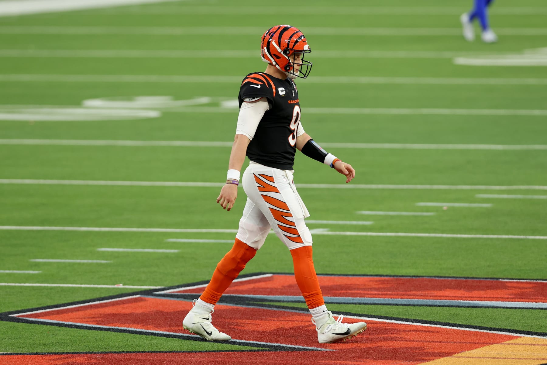 INGLEWOOD, CALIFORNIA - FEBRUARY 13: Joe Burrow #9 of the Cincinnati Bengals walks off the field in the second quarter during Super Bowl LVI against the Los Angeles Rams at SoFi Stadium on February 13, 2022 in Inglewood, California. (Photo by Rob Carr/Getty Images)