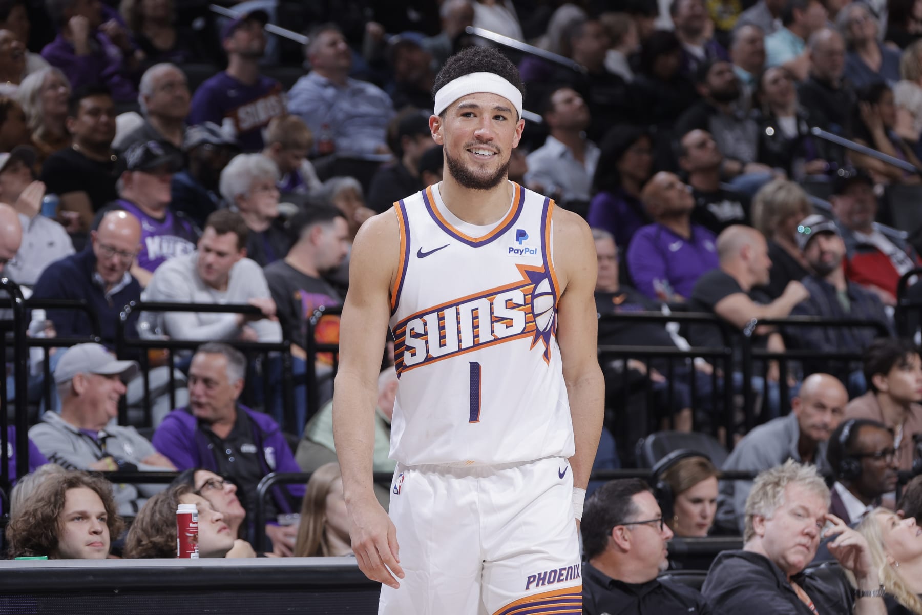 SACRAMENTO, CA - APRIL 12: Devin Booker #1 of the Phoenix Suns smiles during the game against the Sacramento Kings on April 12, 2024 at Golden 1 Center in Sacramento, California. NOTE TO USER: User expressly acknowledges and agrees that, by downloading and or using this photograph, User is consenting to the terms and conditions of the Getty Images Agreement. Mandatory Copyright Notice: Copyright 2024 NBAE (Photo by Rocky Widner/NBAE via Getty Images)