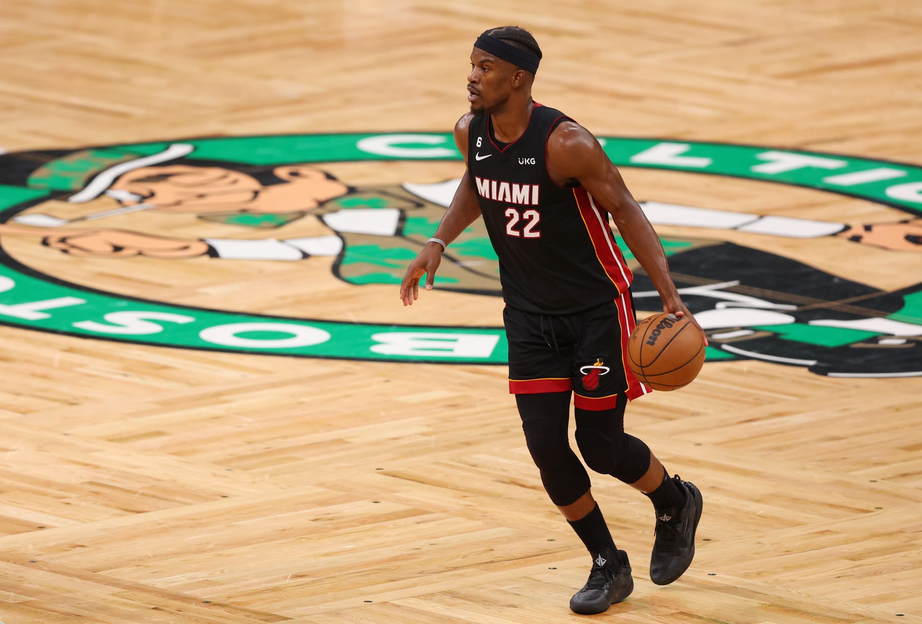 BOSTON, MASSACHUSETTS - MAY 29: Jimmy Butler #22 of the Miami Heat dribbles during the fourth quarter against the Boston Celtics in game seven of the Eastern Conference Finals at TD Garden on May 29, 2023 in Boston, Massachusetts. NOTE TO USER: User expressly acknowledges and agrees that, by downloading and or using this photograph, User is consenting to the terms and conditions of the Getty Images License Agreement. (Photo by Maddie Meyer/Getty Images)