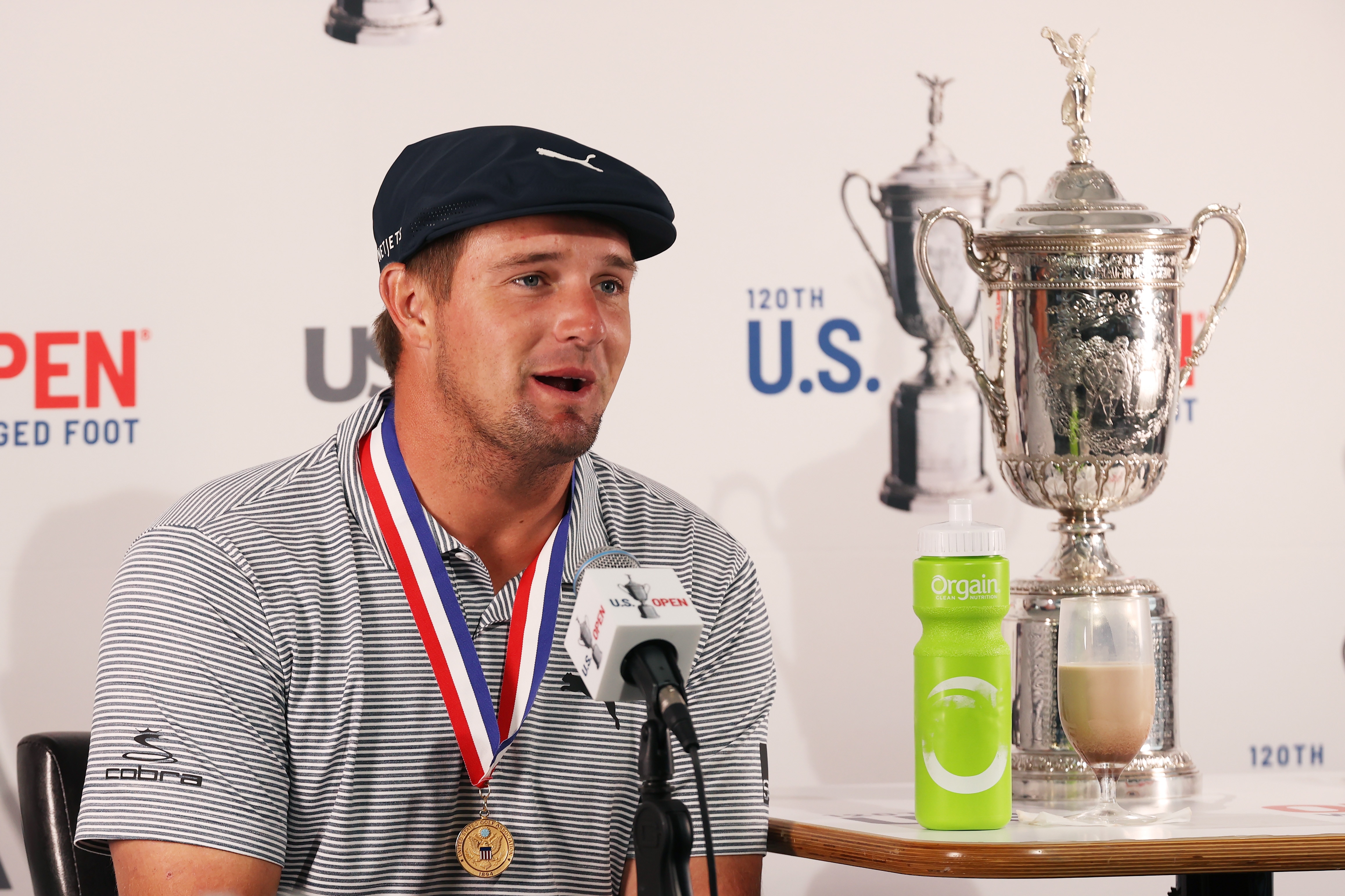 MAMARONECK, NEW YORK - SEPTEMBER 20: Bryson DeChambeau of the United States speaks to the media during a press conference alongside the championship trophy after winning the 120th U.S. Open Championship on September 20, 2020 at Winged Foot Golf Club in Mamaroneck, New York. (Photo by Gregory Shamus/Getty Images)