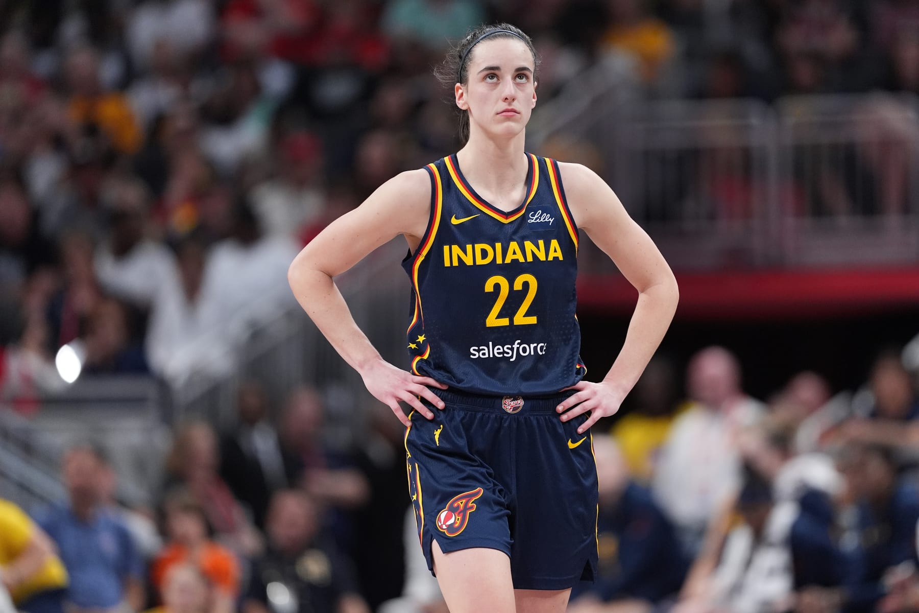 INDIANAPOLIS, INDIANA - JUNE 16: Caitlin Clark #22 of the Indiana Fever looks on during a game against the Chicago Sky at Gainbridge Fieldhouse on June 16, 2024 in Indianapolis, Indiana. NOTE TO USER: User expressly acknowledges and agrees that, by downloading and or using this photograph, User is consenting to the terms and conditions of the Getty Images License Agreement. (Photo by Emilee Chinn/Getty Images)
