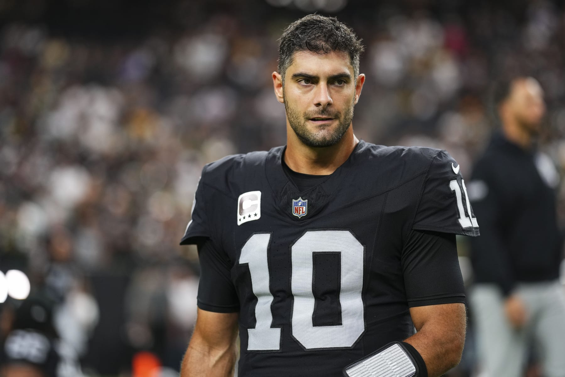LAS VEGAS, NV - OCTOBER 09: Jimmy Garoppolo #10 of the Las Vegas Raiders looks on from the field prior to an NFL football game against the Green Bay Packers at Allegiant Stadium on October 9, 2023 in Las Vegas, Nevada. (Photo by Cooper Neill/Getty Images)