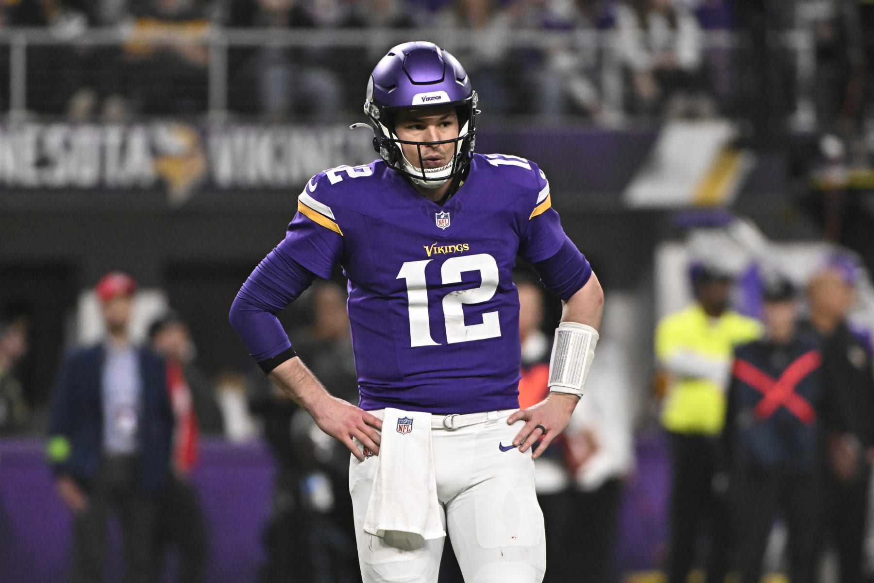 MINNEAPOLIS, MINNESOTA - DECEMBER 31: Nick Mullens #12 of the Minnesota Vikings looks on during the third quarter against the Green Bay Packers at U.S. Bank Stadium on December 31, 2023 in Minneapolis, Minnesota. (Photo by Stephen Maturen/Getty Images)
