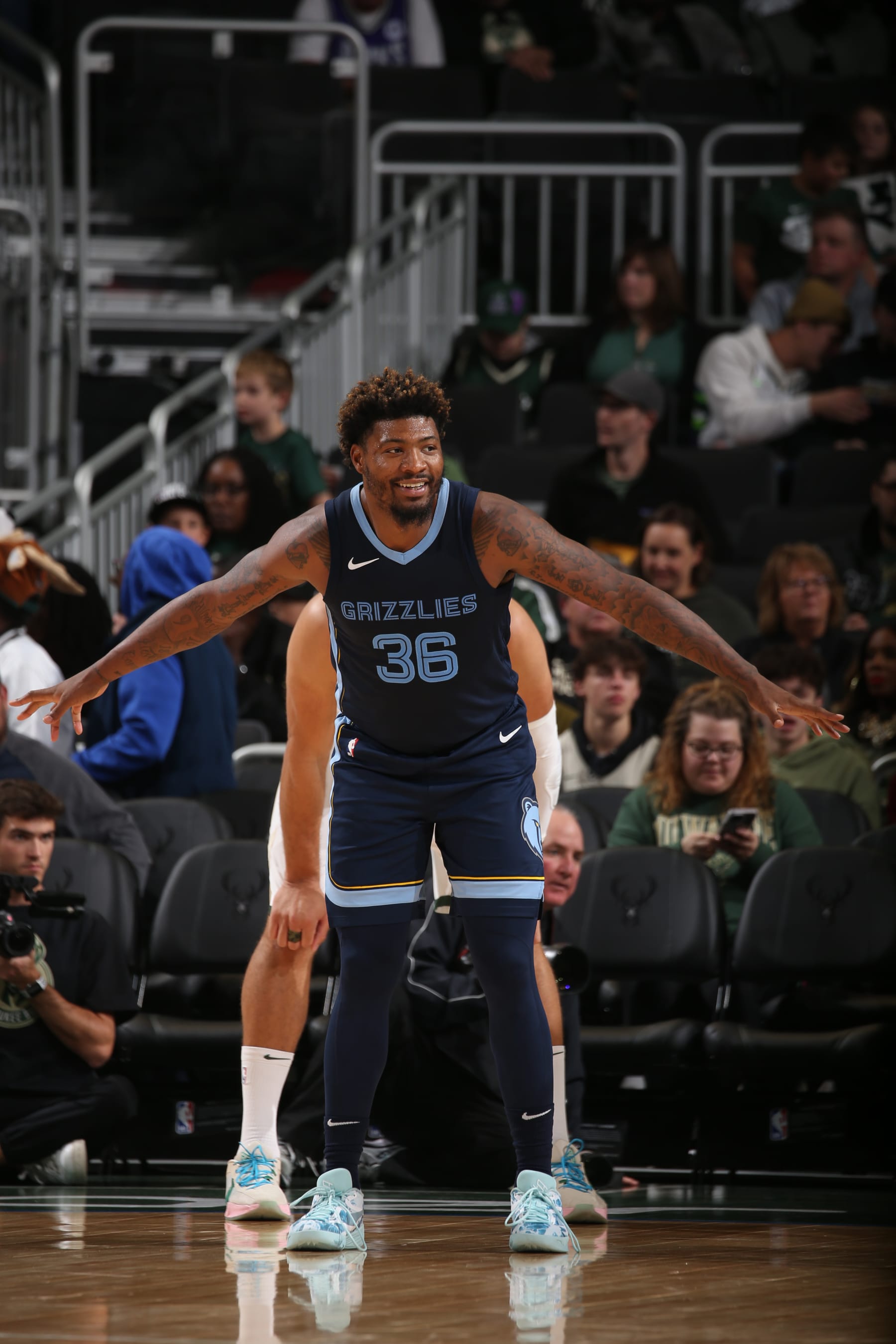 MILWAUKEE, WI - OCTOBER 20: Marcus Smart #36 of the Memphis Grizzlies plays defense during the preseason game on October 20, 2023 at the Fiserv Forum Center in Milwaukee, Wisconsin. NOTE TO USER: User expressly acknowledges and agrees that, by downloading and or using this Photograph, user is consenting to the terms and conditions of the Getty Images License Agreement. Mandatory Copyright Notice: Copyright 2023 NBAE (Photo by Gary Dineen/NBAE via Getty Images).
