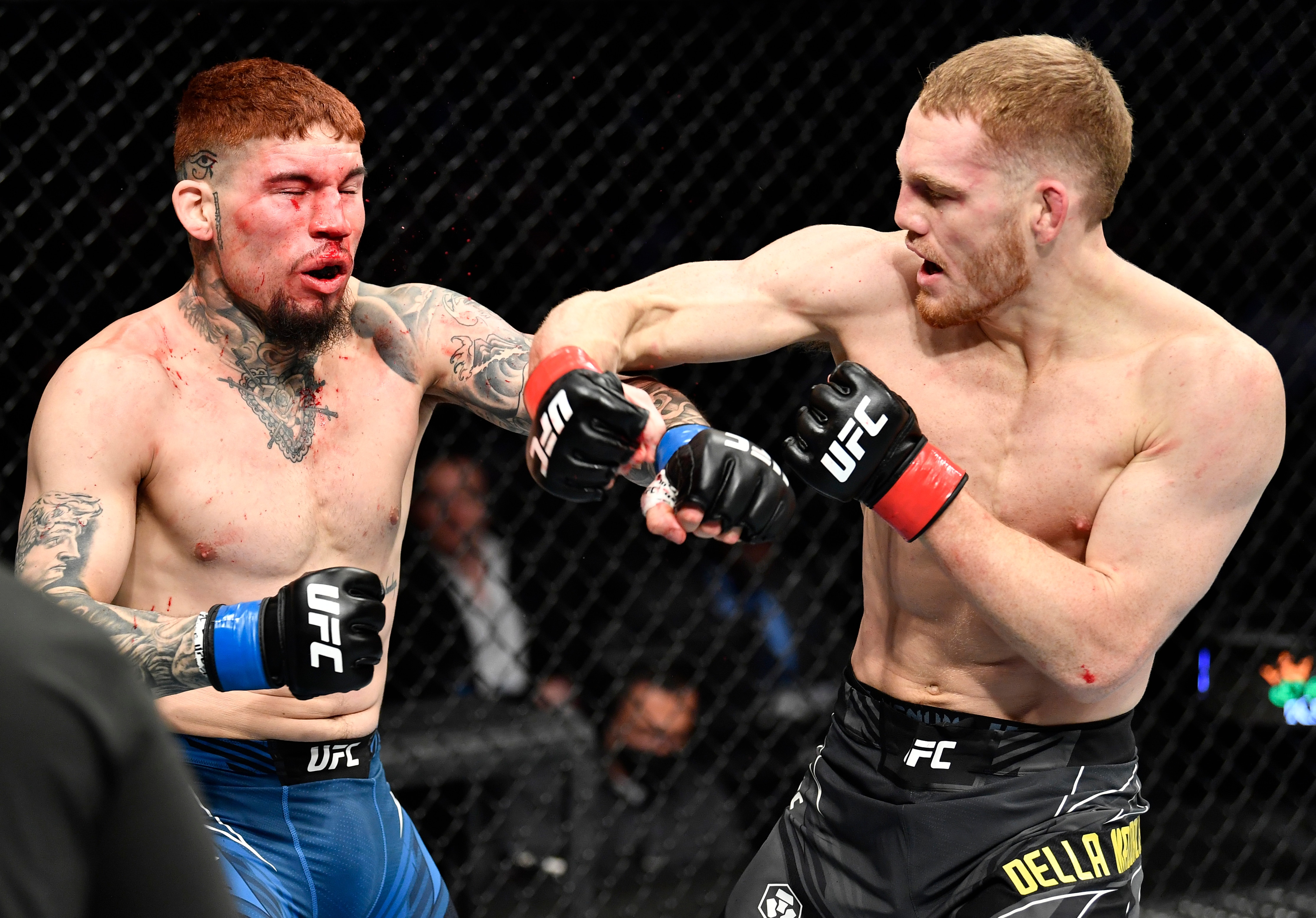ANAHEIM, CALIFORNIA - JANUARY 22: (R-L) Jack Della Maddalena of Australia punches Pete Rodriguez in their welterweight fight during the UFC 270 event at Honda Center on January 22, 2022 in Anaheim, California. (Photo by Chris Unger/Zuffa LLC)