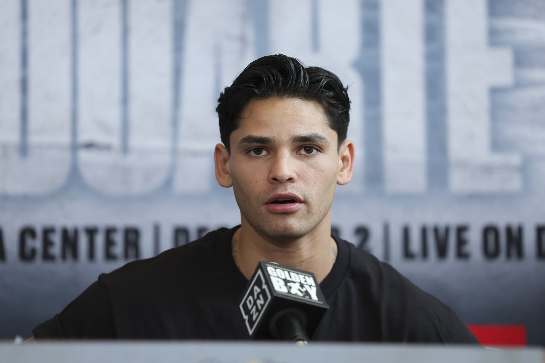 HOUSTON, TEXAS - OCTOBER 25: Ryan Garcia speaks during a press conference to promote his fight against Oscar Duarte at Toyota Center on October 25, 2023 in Houston, Texas. (Photo by Cris Esqueda/Golden Boy/Getty Images)