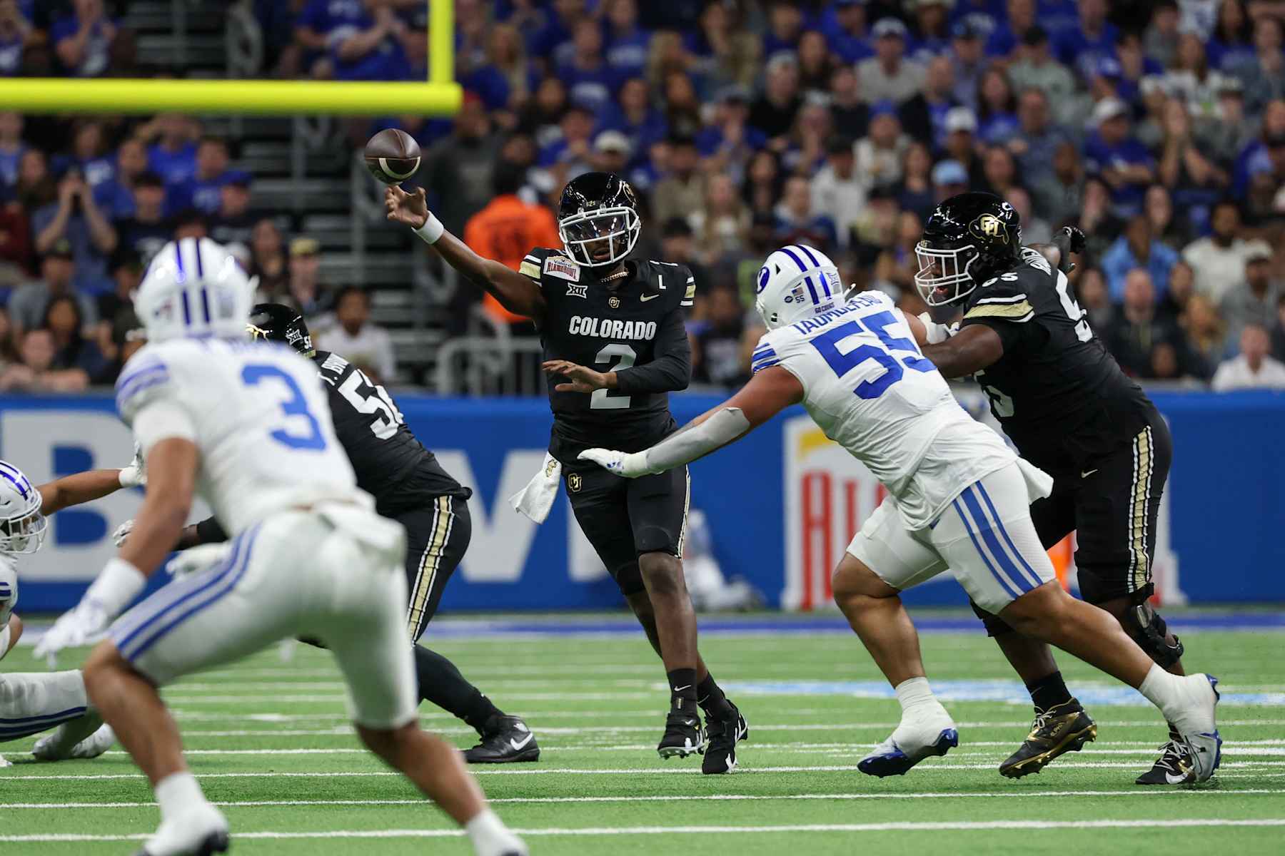 SAN ANTONIO, TX - DECEMBER 28: Colorado Buffaloes quarterback Shedeur Sanders (2) passes the ball during the football game between BYU Cougars and Colorado Buffalos on December 28, 2024, at the Alamodome in San Antonio, Texas. (Photo by David Buono/Icon Sportswire via Getty Images)