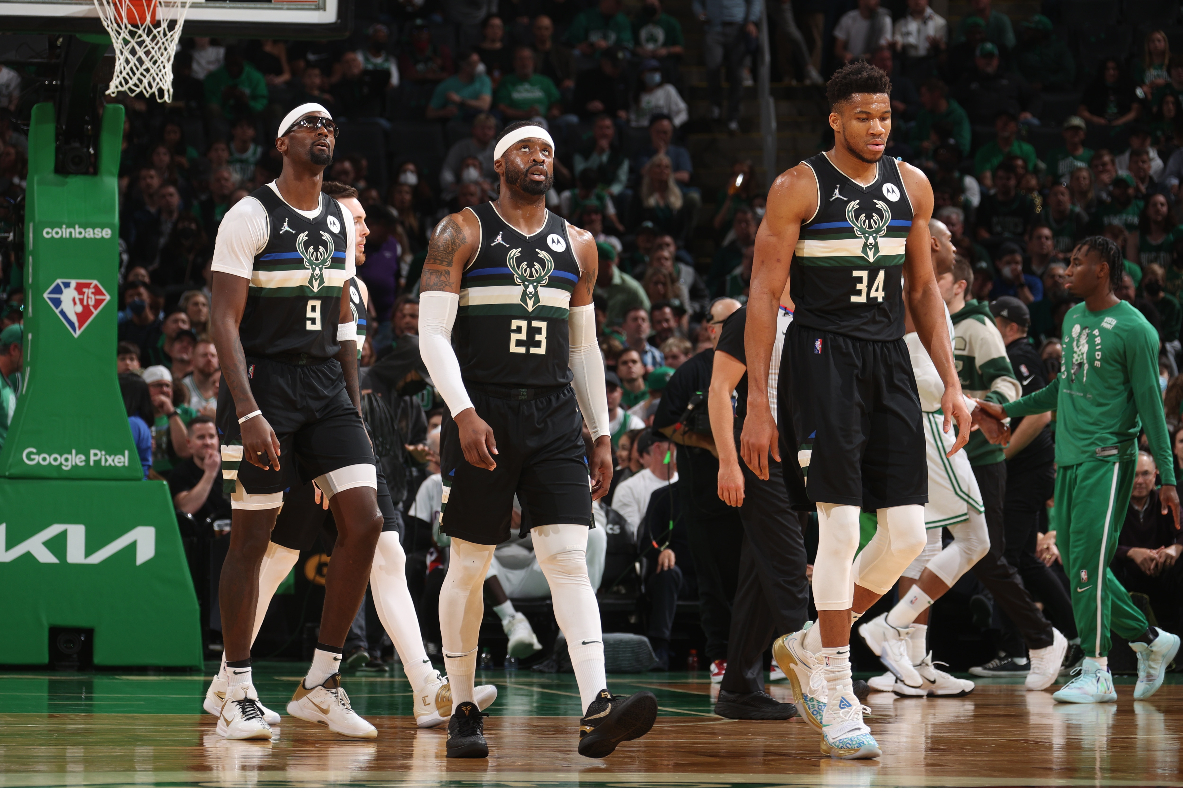 BOSTON, MA - MAY 11: Bobby Portis #9, Wesley Matthews #23 and Giannis Antetokounmpo #34 of the Milwaukee Bucks look on during Game 5 of the 2022 NBA Playoffs Eastern Conference Semifinals on May 11, 2022 at the TD Garden in Boston, Massachusetts.  NOTE TO USER: User expressly acknowledges and agrees that, by downloading and or using this photograph, User is consenting to the terms and conditions of the Getty Images License Agreement. Mandatory Copyright Notice: Copyright 2022 NBAE  (Photo by Nathaniel S. Butler/NBAE via Getty Images)