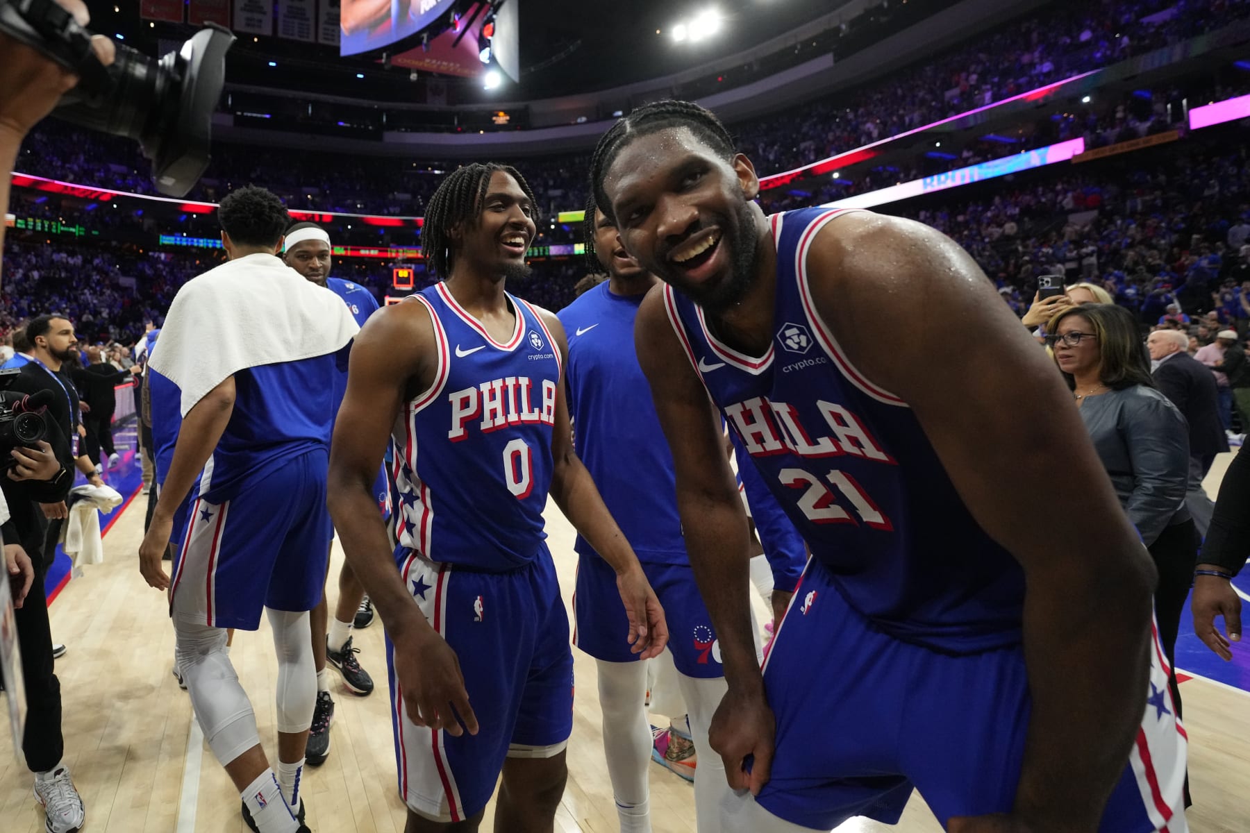 PHILADELPHIA, PA - APRIL 17: Tyrese Maxey #0 and Joel Embiid #21 of the Philadelphia 76ers celebrate after the game against the Miami Heat during the 2024 NBA Play-In Tournament on April 17, 2024 at the Wells Fargo Center in Philadelphia, Pennsylvania NOTE TO USER: User expressly acknowledges and agrees that, by downloading and/or using this Photograph, user is consenting to the terms and conditions of the Getty Images License Agreement. Mandatory Copyright Notice: Copyright 2024 NBAE (Photo by Jesse D. Garrabrant/NBAE via Getty Images)
