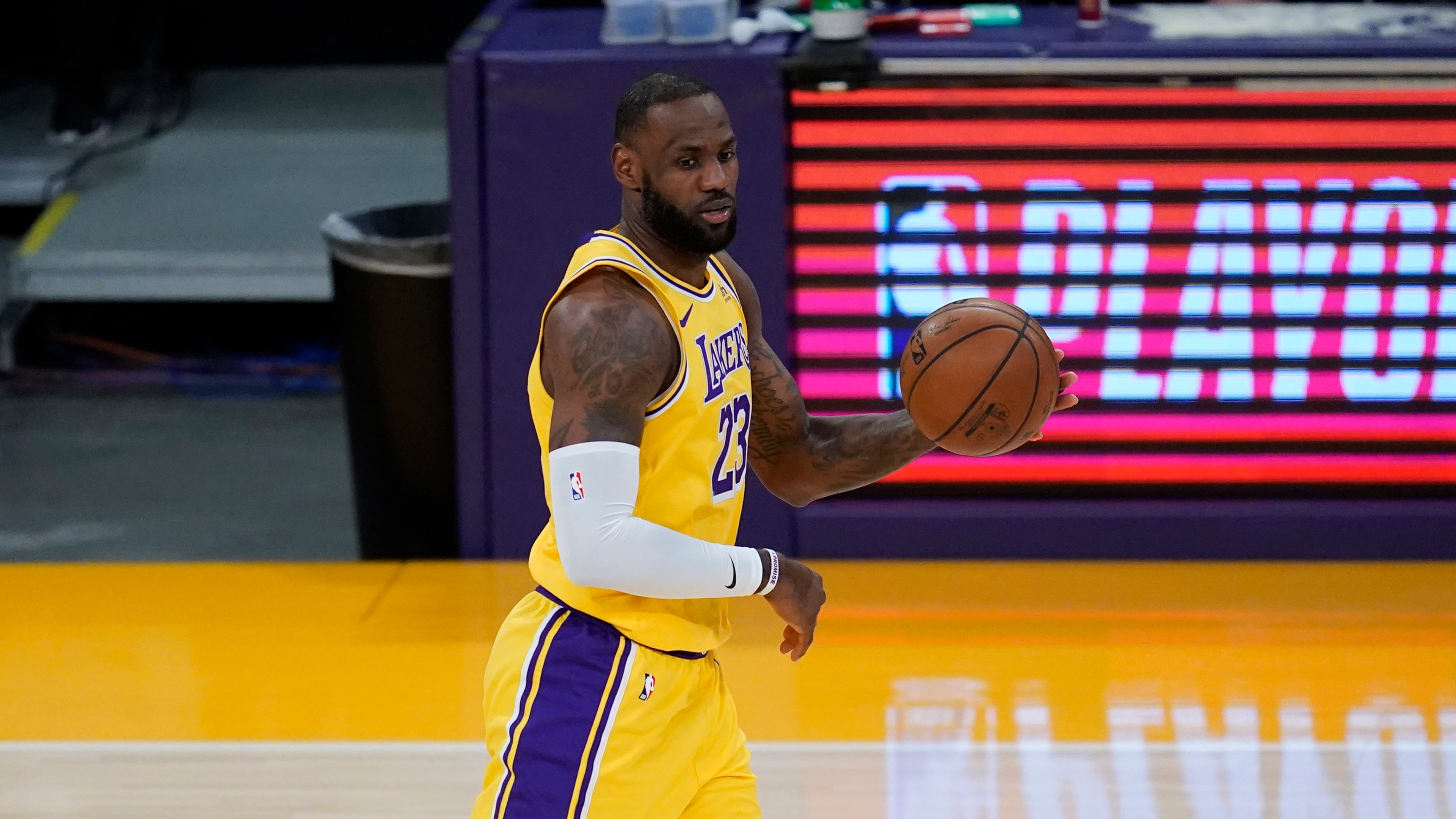 Los Angeles Lakers forward LeBron James (23) controls the ball during Game 6 of an NBA basketball first-round playoff series against the Phoenix Suns Thursday, Jun 3, 2021, in Los Angeles. (AP Photo/Ashley Landis)
