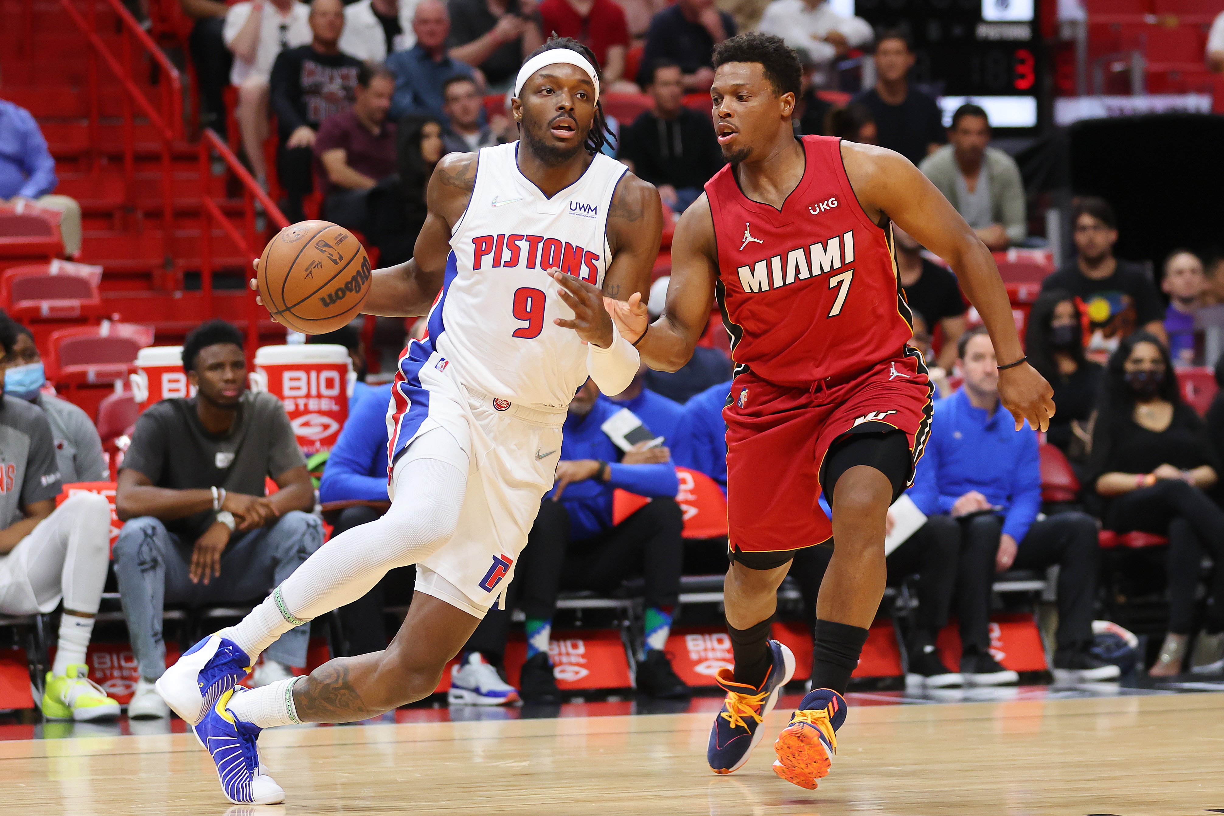 MIAMI, FLORIDA - MARCH 15: Jerami Grant #9 of the Detroit Pistons drives to the basket against Kyle Lowry #7 of the Miami Heat during the first half at FTX Arena on March 15, 2022 in Miami, Florida. NOTE TO USER: User expressly acknowledges and agrees that, by downloading and or using this photograph, User is consenting to the terms and conditions of the Getty Images License Agreement.  (Photo by Michael Reaves/Getty Images)