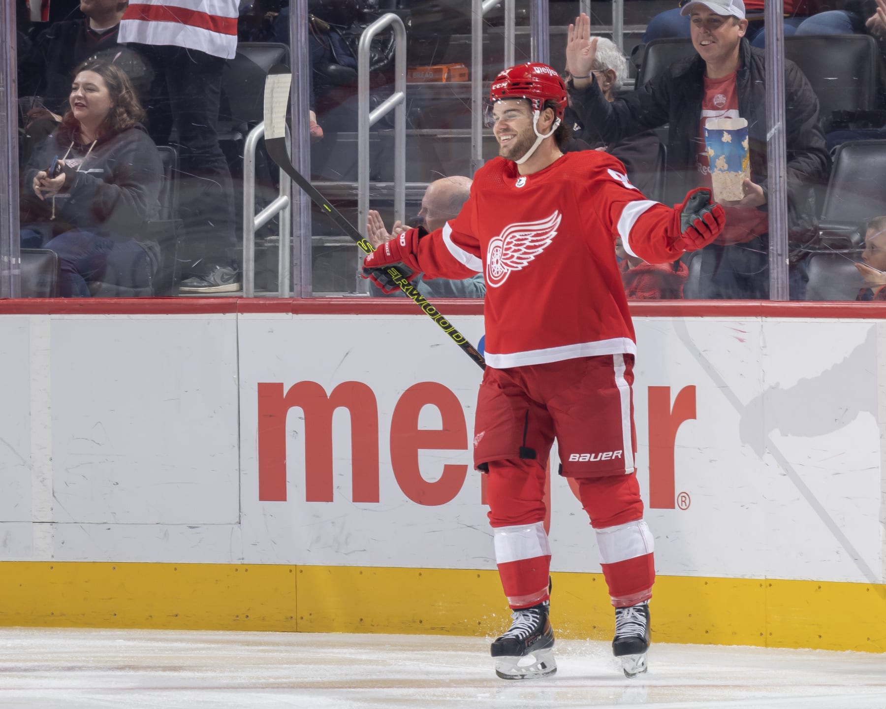 DETROIT, MI - OCTOBER 22: Alex DeBrincat #93 of the Detroit Red Wings celebrates a goal against the Calgary Flames during the first period at Little Caesars Arena on October 22, 2023 in Detroit, Michigan. (Photo by Dave Reginek/NHLI via Getty Images)