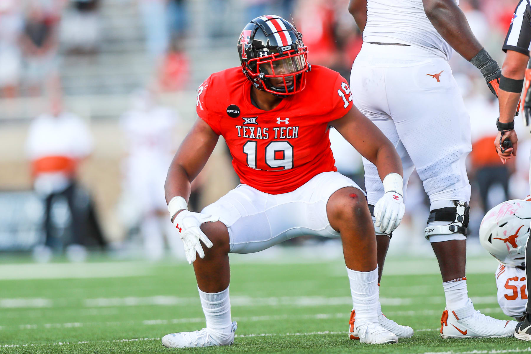 LUBBOCK, TEXAS - SEPTEMBER 26: Defensive lineman Tyree Wilson #19 of the Texas Tech Red Raiders reacts after a tackle during the second half of the college football game against the Texas Longhorns on September 26, 2020 at Jones AT&T Stadium in Lubbock, Texas. (Photo by John E. Moore III/Getty Images)