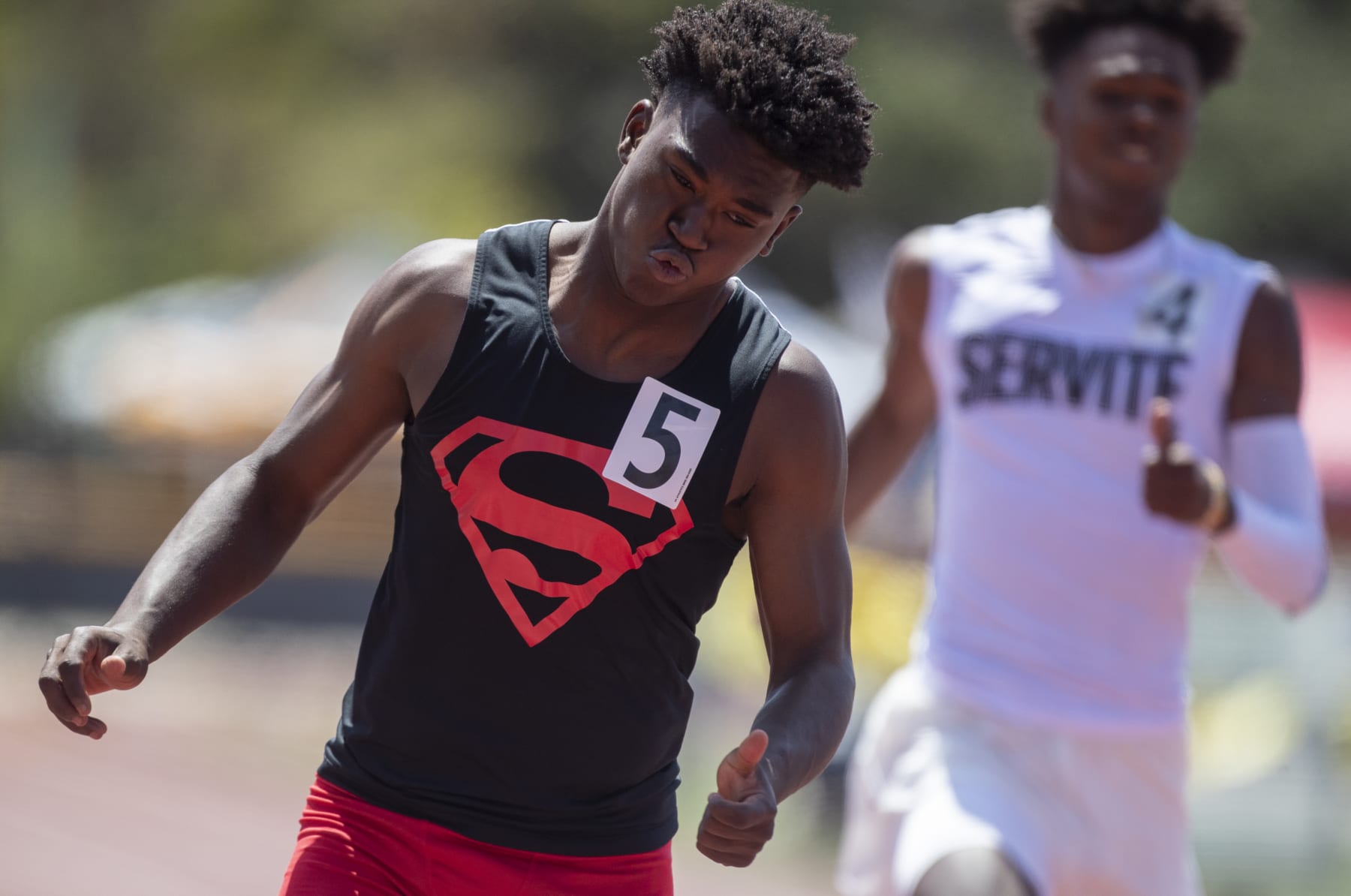 Moorpark, CA - May 21: Rodrick Pleasant of Gardena Serra High crosses the finish line to win the 100 meters and a state record in 10.14 seconds at the Southern Section Masters Meet at Moorpark High School on Saturday, May 21, 2022 in Moorpark, CA. (Brian van der Brug / Los Angeles Times via Getty Images)