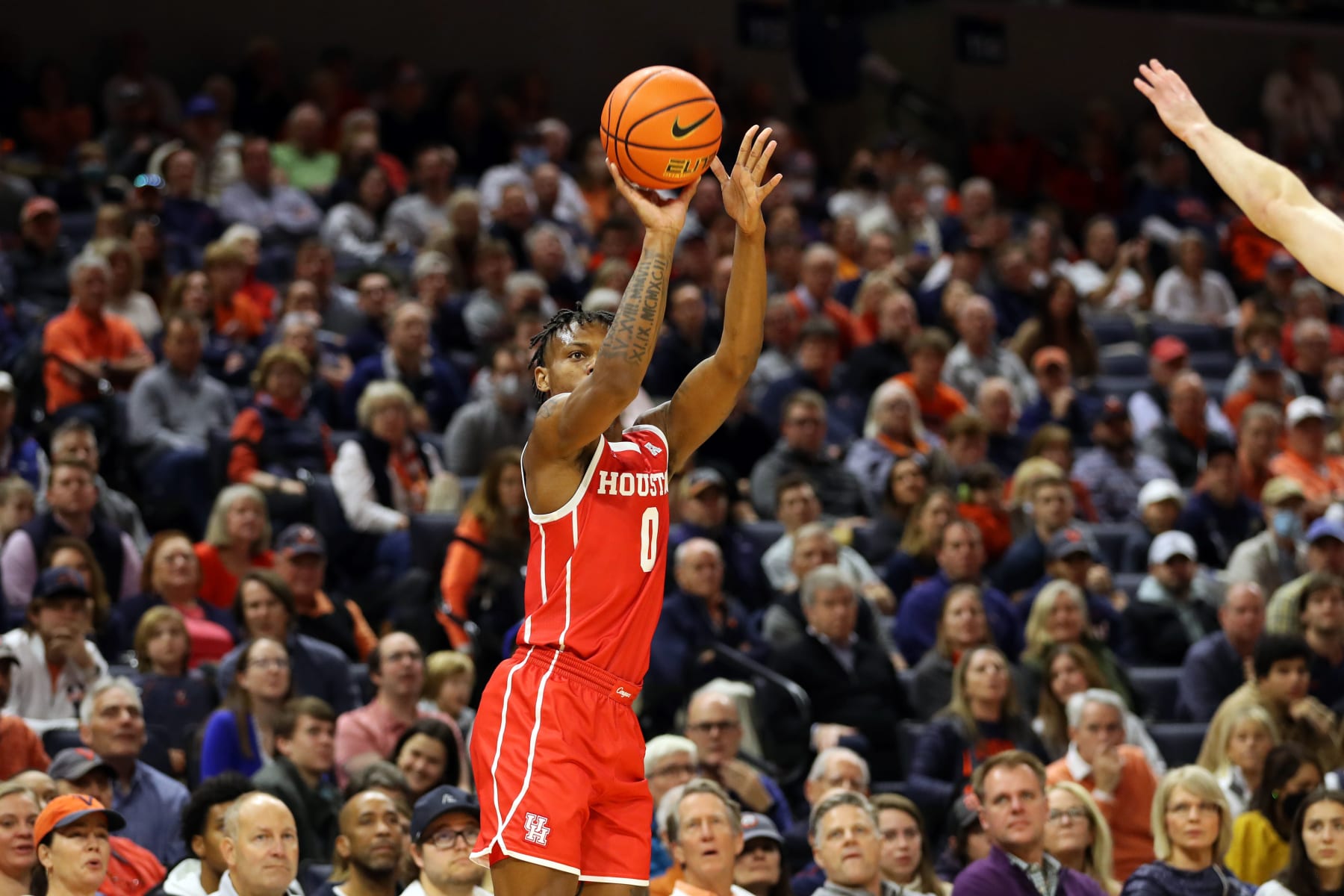 CHARLOTTESVILLE, VA - DECEMBER 17: Marcus Sasser #0 of the Houston Cougars shoots in the first half during a game against the Virginia Cavaliers at John Paul Jones Arena on December 17, 2022 in Charlottesville, Virginia. (Photo by Ryan M. Kelly/Getty Images)