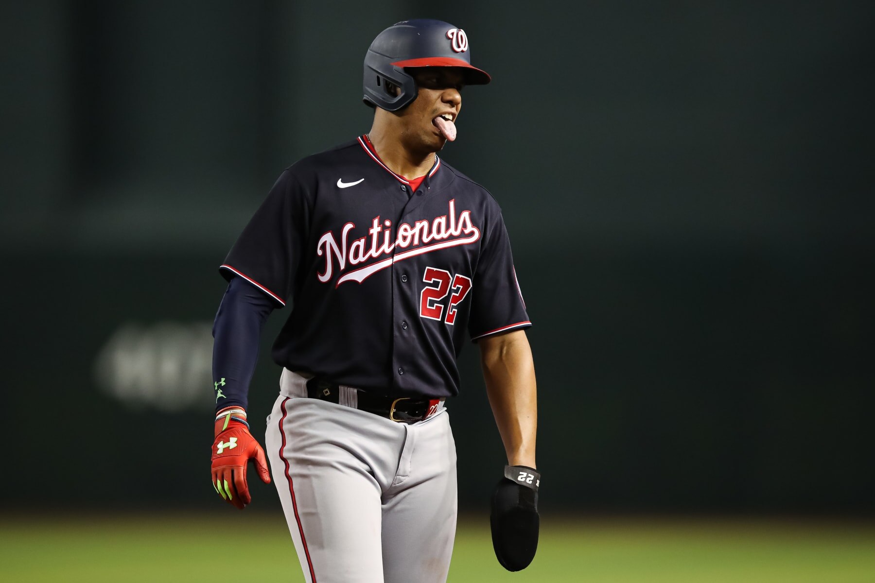 PHOENIX, AZ - JULY 22: Juan Soto #22 of the Washington Nationals reacts on the base path during the MLB game against the Arizona Diamondbacks at Chase Field on July 22, 2022 in Phoenix, Arizona. (Photo by Mike Christy/Getty Images)