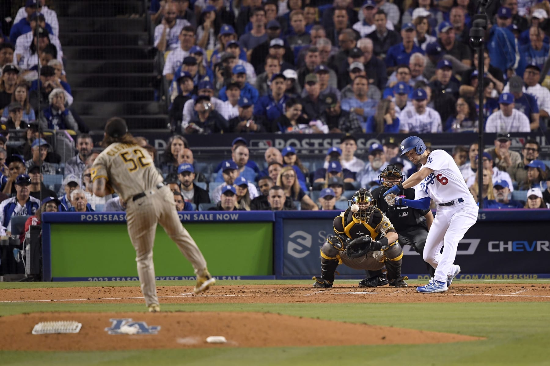LOS ANGELES, CALIFORNIA - OCTOBER 11: Trea Turner #6 of the Los Angeles Dodgers hits a double during the third inning in game one of the National League Division Series against the San Diego Padres at Dodger Stadium on October 11, 2022 in Los Angeles, California. (Photo by Kevork Djansezian/Getty Images)
