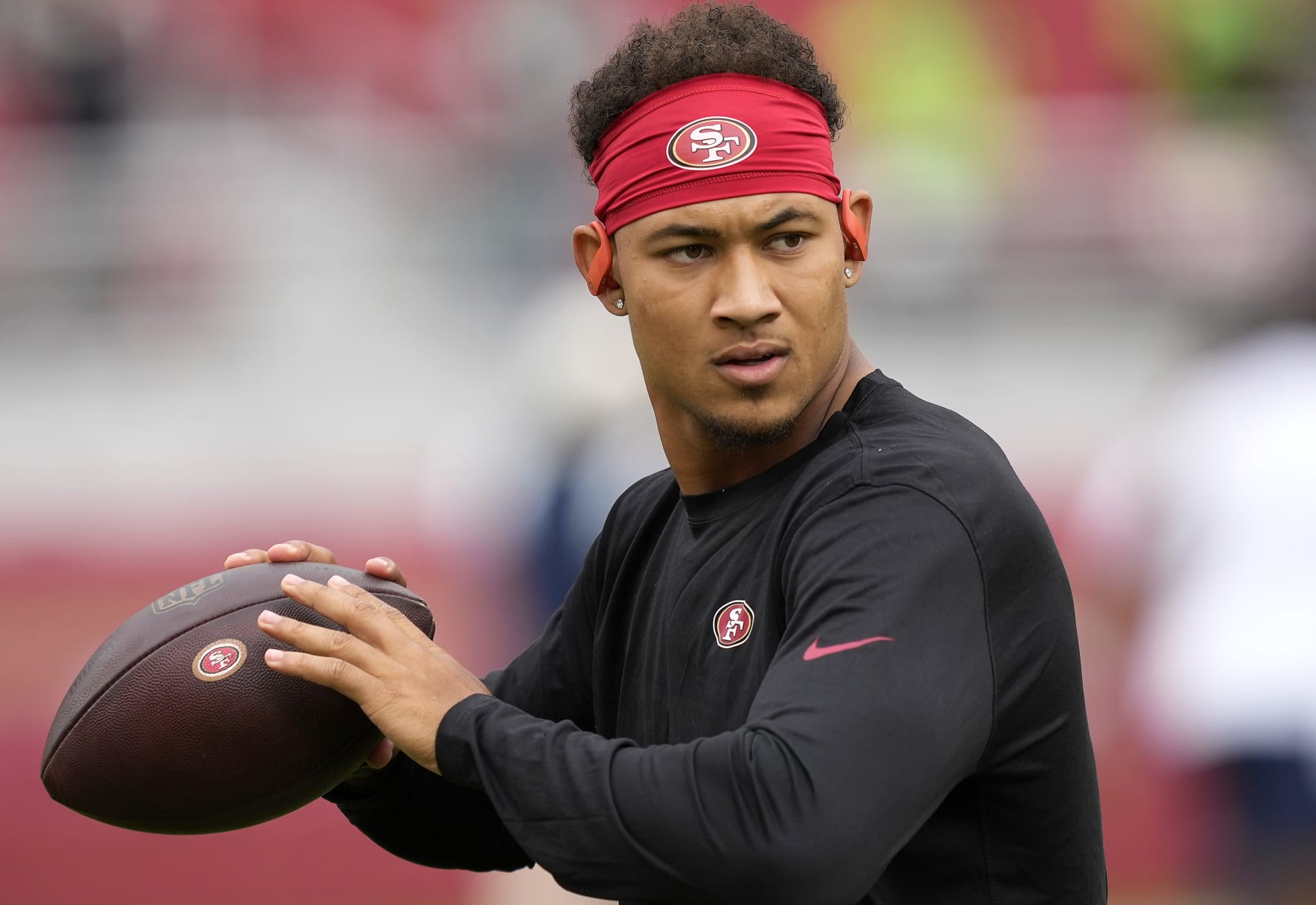 SANTA CLARA, CALIFORNIA - SEPTEMBER 18: Trey Lance #5 of the San Francisco 49ers warms up before the game against the Seattle Seahawks at Levi's Stadium on September 18, 2022 in Santa Clara, California. (Photo by Thearon W. Henderson/Getty Images)