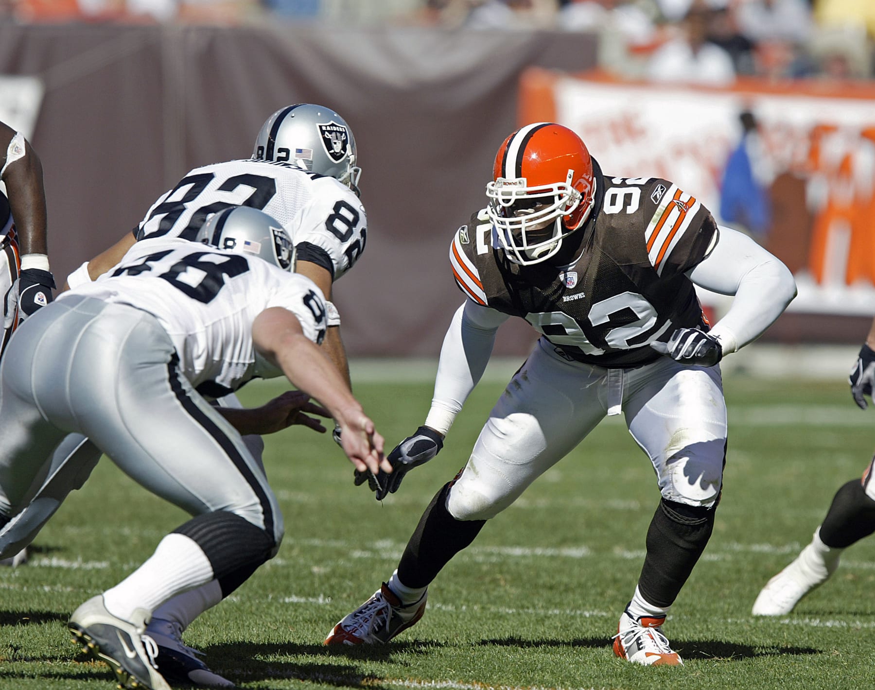 CLEVELAND, OH - OCTOBER 12:  Defensive lineman Courtney Brown #92 of the Cleveland Browns pursues the play against the Oakland Raiders during a game at Cleveland Browns Stadium on October 12, 2003 in Cleveland, Ohio.  The Browns defeated the Raiders 13-7.  (Photo by George Gojkovich/Getty Images) *** Local Caption *** Courtney Brown