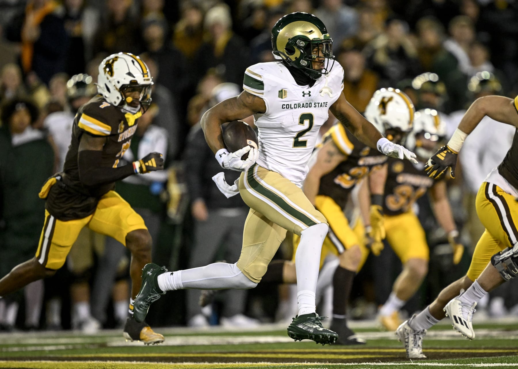 LARAMIE, WY - NOVEMBER 3: Justus Ross-Simmons (2) of the Colorado State Rams runs against the Wyoming Cowboys during the second half of UW's 24-15 Border War win at War Memorial Stadium in Laramie, Wyoming on Friday, November 3, 2023. (Photo by AAron Ontiveroz/The Denver Post)