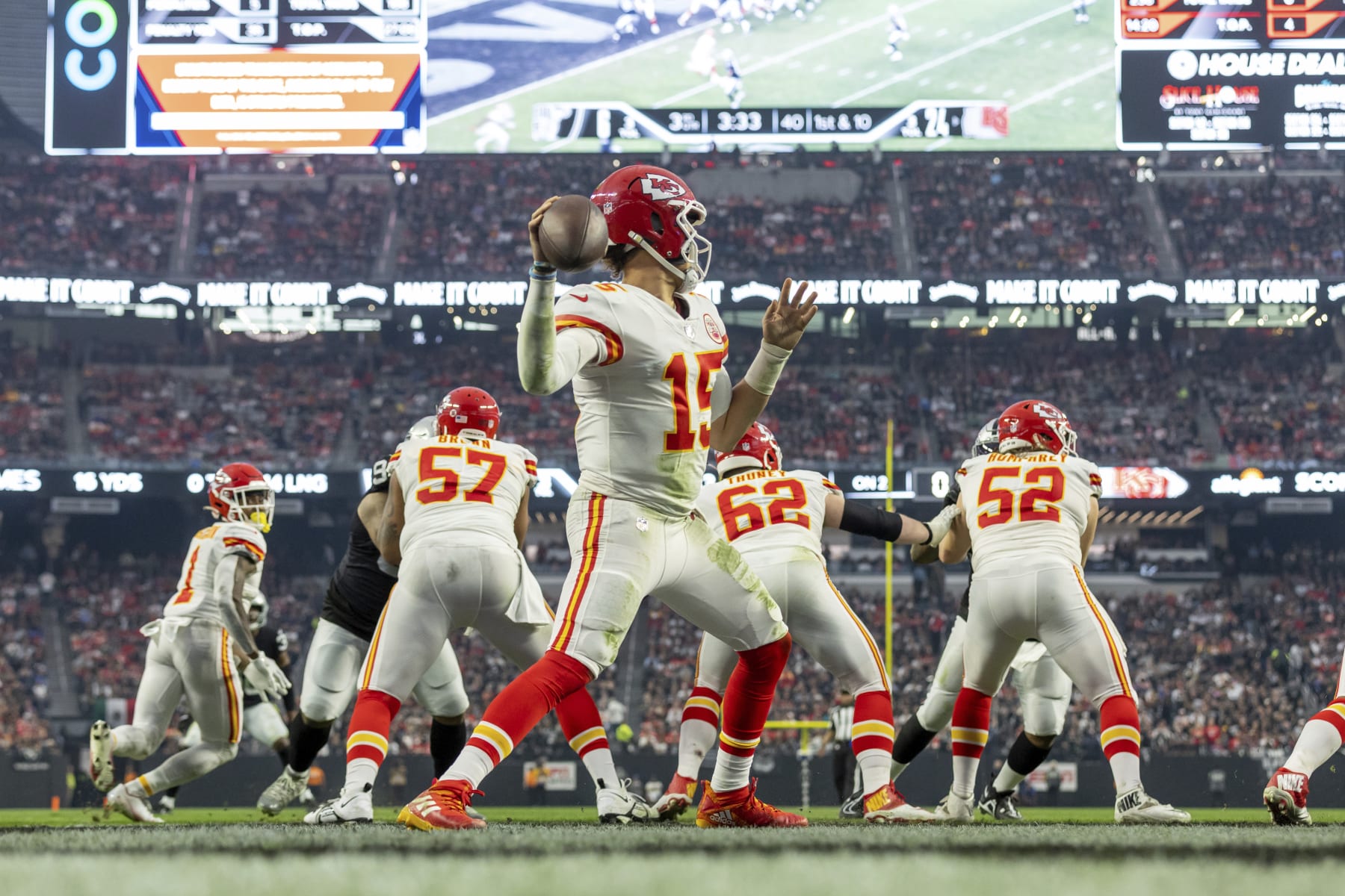 Kansas City Chiefs quarterback Patrick Mahomes (15) passes the ball against the Las Vegas Raiders in an NFL football game, Saturday, Jan. 7, 2023, in Las Vegas, NV. Chiefs defeated the Raiders 31-13. (AP Photo/Jeff Lewis)