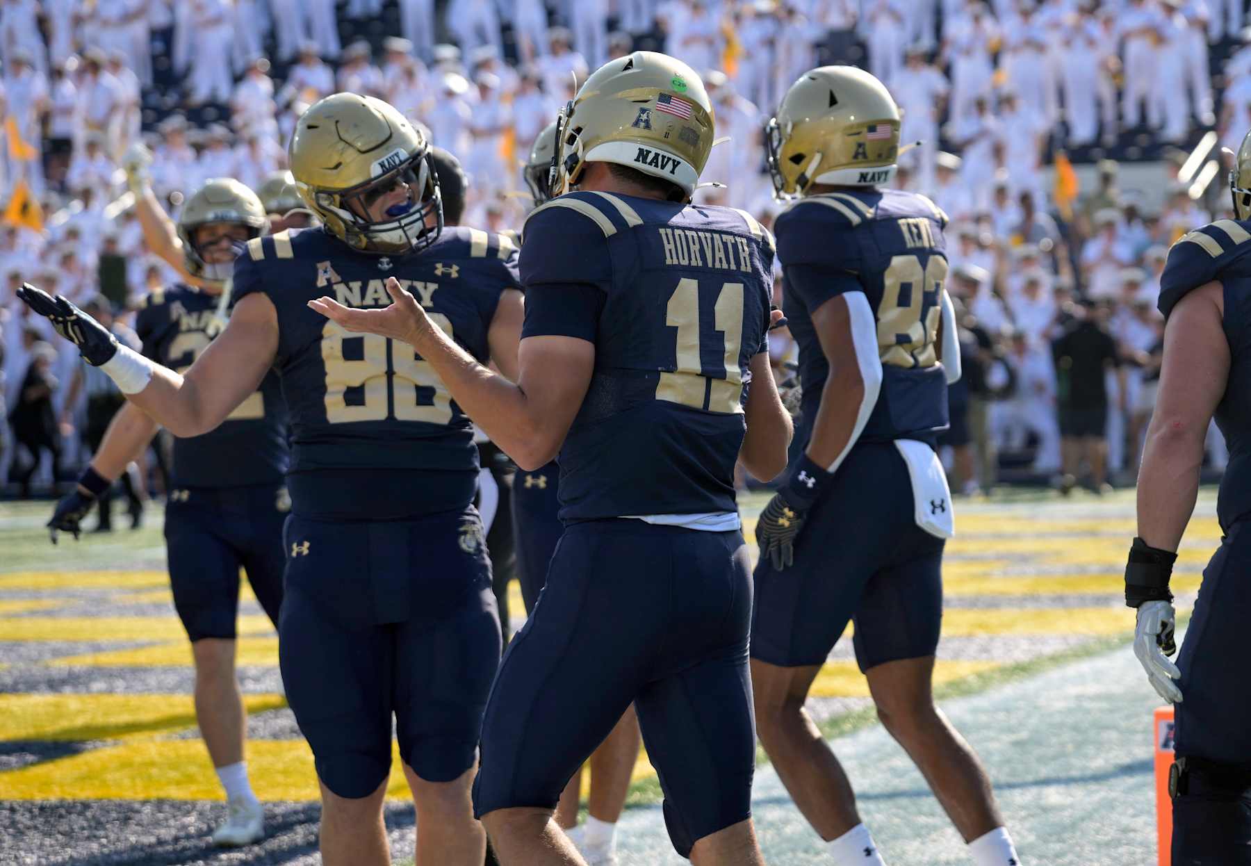 ANNAPOLIS, MD - SEPTEMBER 21:  Navy Midshipmen quarterback Blake Horvath (11) reacts with tight end Thomas Scully (88) following his touchdown run during the Memphis Tigers game versus the Naval Academy Midshipmen on September 21, 2024 at Navy - Marine Corps Memorial Stadium in Annapolis, MD. (Photo by Mark Goldman/Icon Sportswire via Getty Images)