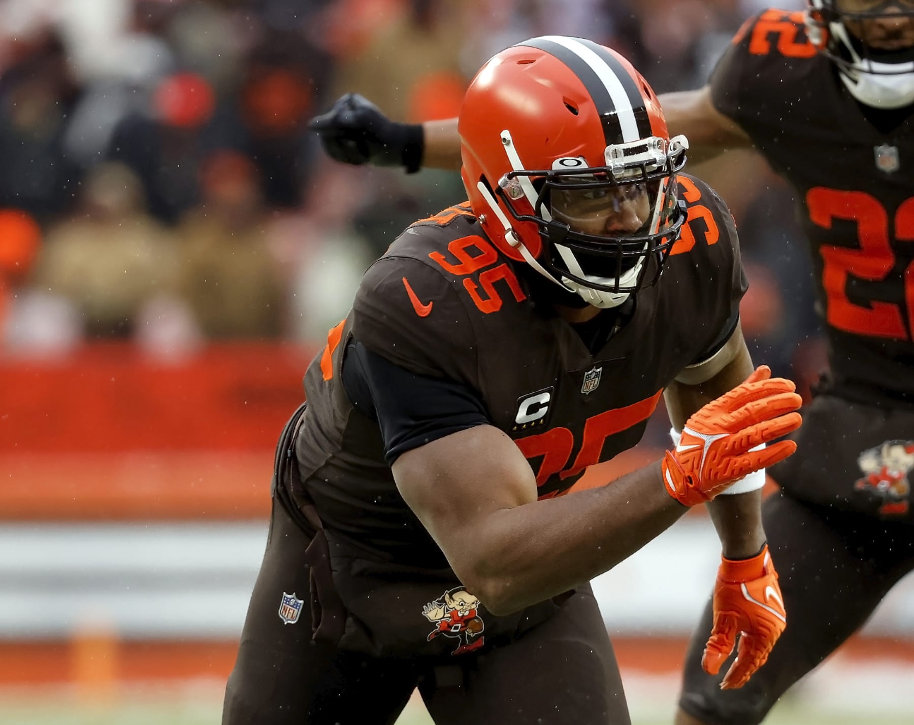 FILE - Cleveland Browns defensive end Myles Garrett (95) rushes during an NFL football game against the New Orleans Saints, Saturday, Dec. 24, 2022, in Cleveland. Garrett's failure to communicate with the Browns led to coach Kevin Stefanski benching him for the start of last week's game, a decision Cleveland's Pro Bowl defensive end said he respected (AP Photo/Kirk Irwin, File)
