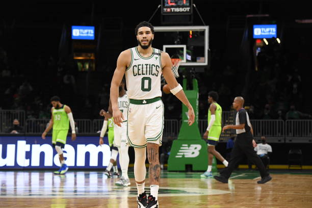 BOSTON, MA - APRIL 9:  Jayson Tatum #0 of the Boston Celtics looks on during the game against the Minnesota Timberwolveson April 9, 2021 at the TD Garden in Boston, Massachusetts.  NOTE TO USER: User expressly acknowledges and agrees that, by downloading and or using this photograph, User is consenting to the terms and conditions of the Getty Images License Agreement. Mandatory Copyright Notice: Copyright 2021 NBAE  (Photo by Brian Babineau/NBAE via Getty Images)