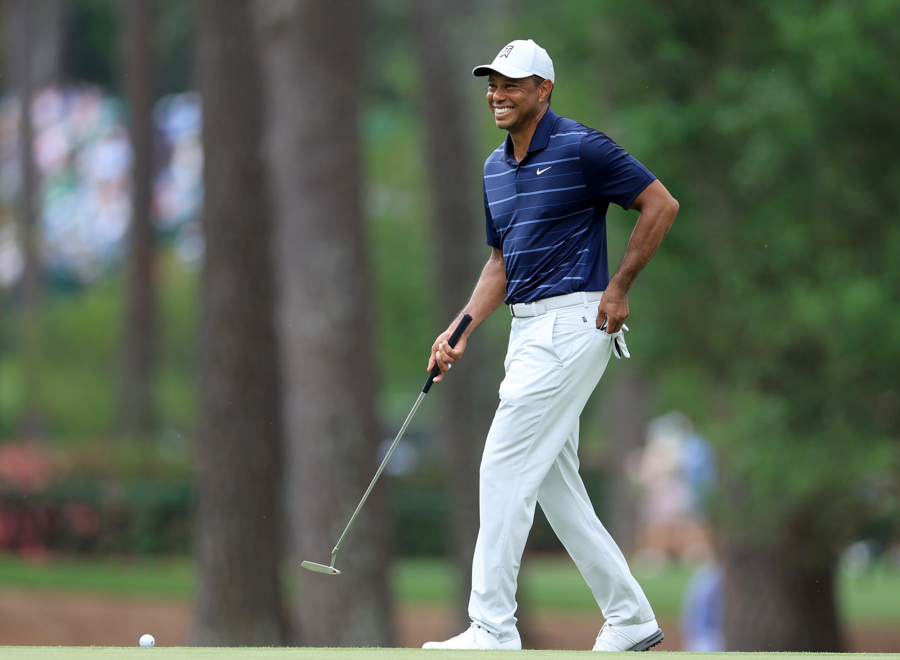AUGUSTA, GEORGIA - APRIL 07: Tiger Woods of The United States smiles on the green on the third hole during the second round of the 2023 Masters Tournament at Augusta National Golf Club on April 07, 2023 in Augusta, Georgia. (Photo by David Cannon/Getty Images)