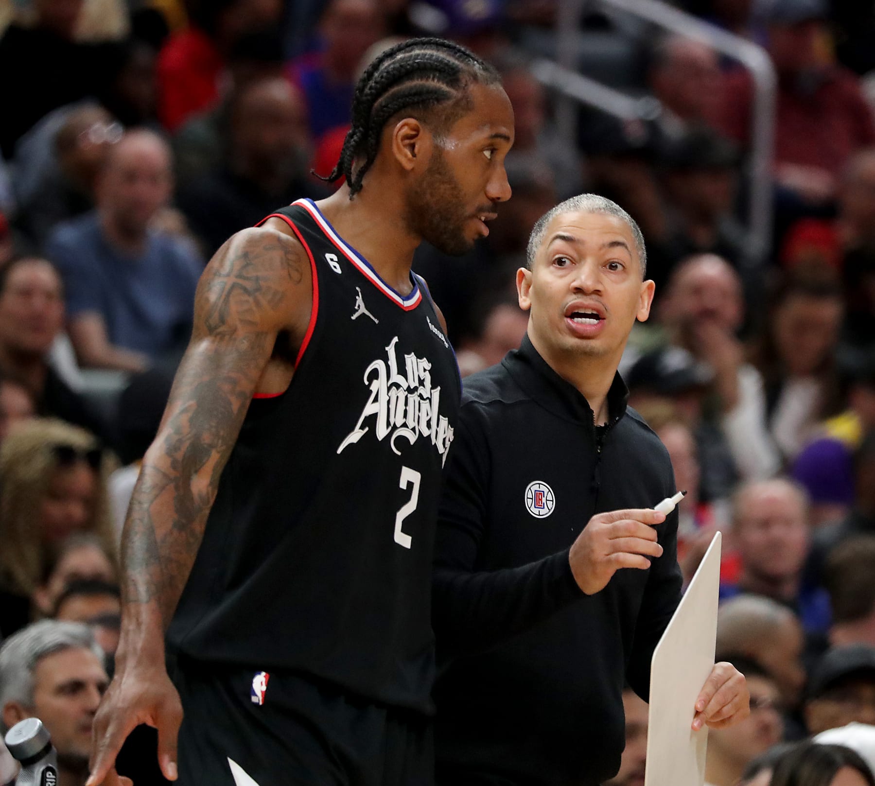 Los Angeles, CA - April 05: Clippers forward Kawhi Leonard tal;ks with coach Tyronn Lue in the third quarter Tuesday night, Apr. 5, 2023, at Crypto.com Arena. (Luis Sinco / Los Angeles Times via Getty Images)