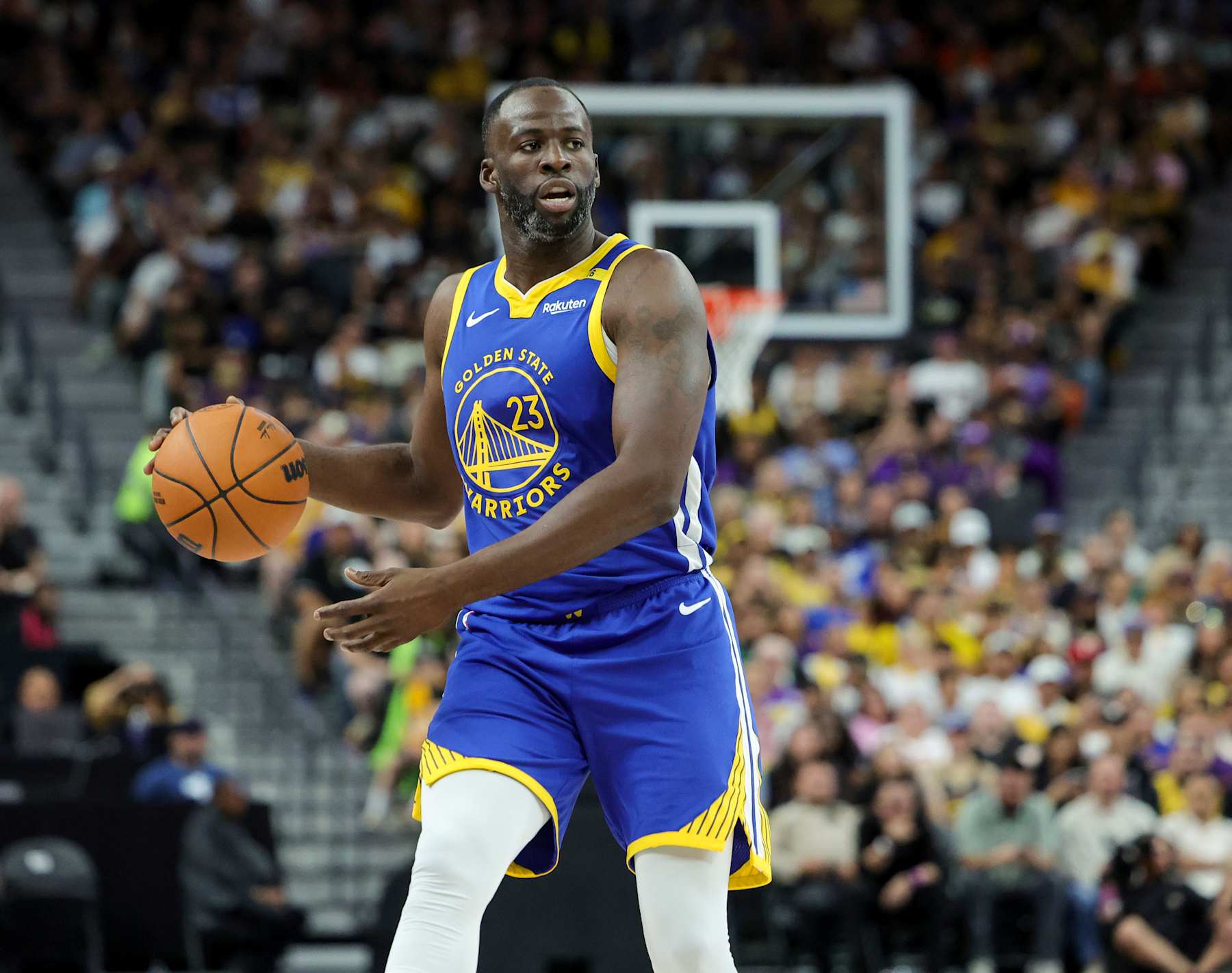 LAS VEGAS, NEVADA - OCTOBER 15: Draymond Green #23 of the Golden State Warriors brings the ball up the court against the Los Angeles Lakers in the second quarter of their preseason game at T-Mobile Arena at T-Mobile Arena on October 15, 2024 in Las Vegas, Nevada. The Warriors defeated the Lakers 111-97. NOTE TO USER: User expressly acknowledges and agrees that, by downloading and or using this photograph, User is consenting to the terms and conditions of the Getty Images License Agreement. (Photo by Ethan Miller/Getty Images)