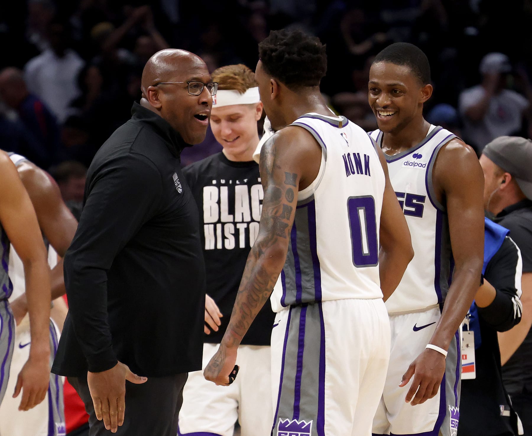 LOS ANGELES, CALIFORNIA - FEBRUARY 24: Head coach Mike Brown of the Sacramento Kings celebrates a 176-175 double overtime win over the LA Clippers with Malik Monk #0 and De'Aaron Fox #5 at Crypto.com Arena on February 24, 2023 in Los Angeles, California. User is consenting to the terms and conditions of the Getty Images License Agreement. (Photo by Harry How/Getty Images)