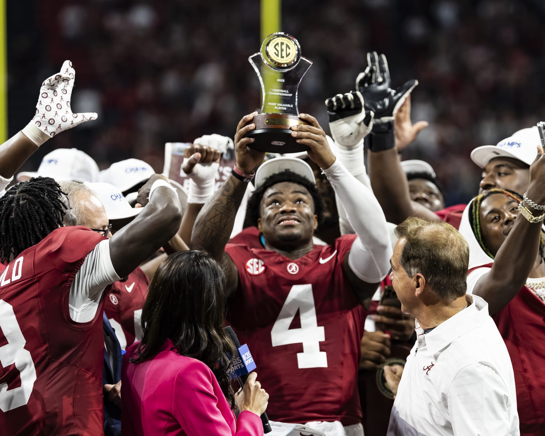 ATLANTA, GEORGIA - DECEMBER 2: Jalen Milroe #4 of the Alabama Crimson Tide gets the most valuable player award during a game between University of Georgia and University of Alabama at Mercedes-Benz Stadium on December 2, 2023 in Atlanta, Georgia. (Photo by Steve Limentani/ISI Photos/Getty Images)