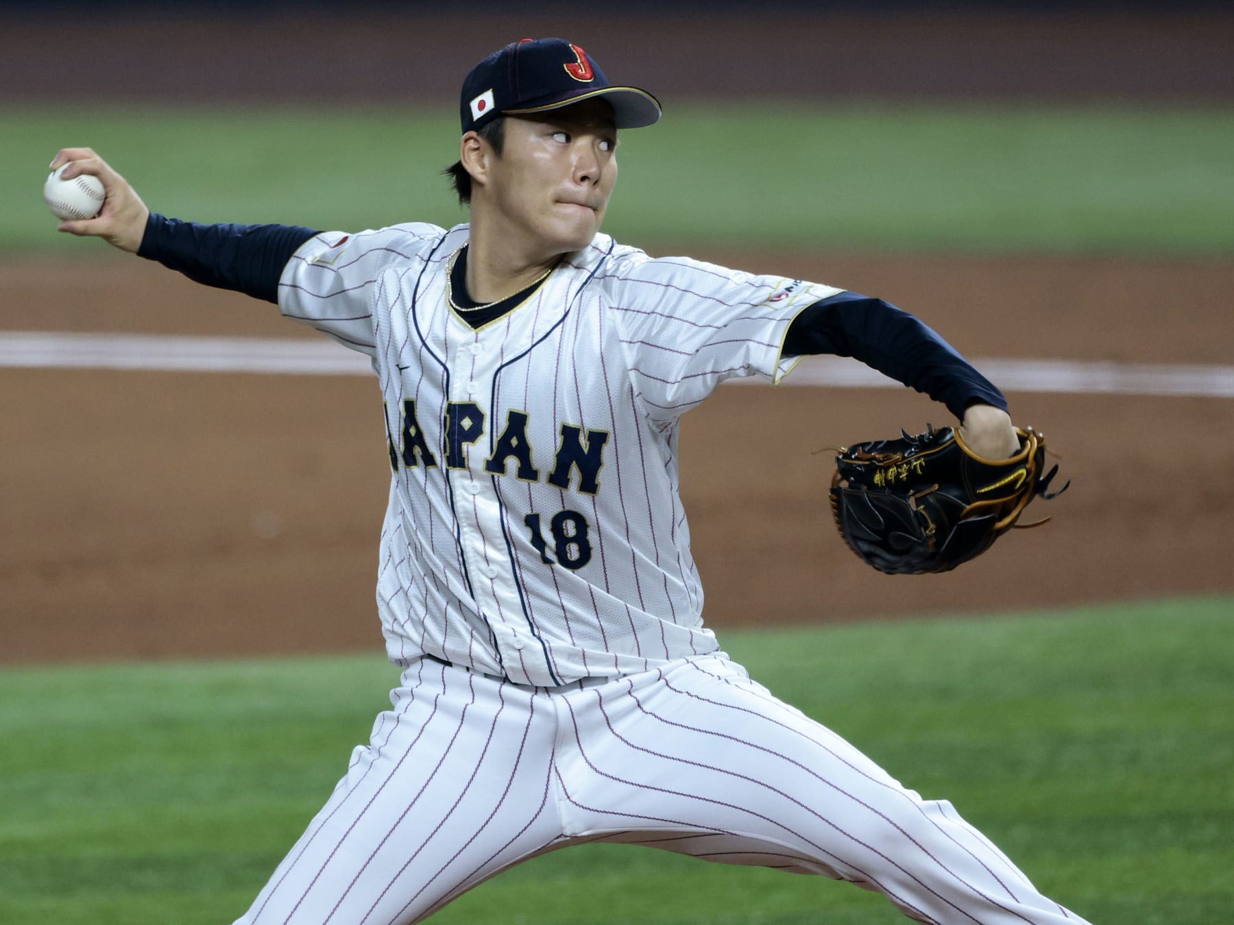 MIAMI, FL - MARCH 20: Yoshinobu Yamamoto #18 of Team Japan pitches during the 2023 World Baseball Classic Semifinal game against Team Mexico at loanDepot Park on Monday, March 20, 2023 in Miami, Florida. (Photo by Christopher Pasatieri/Getty Images)
